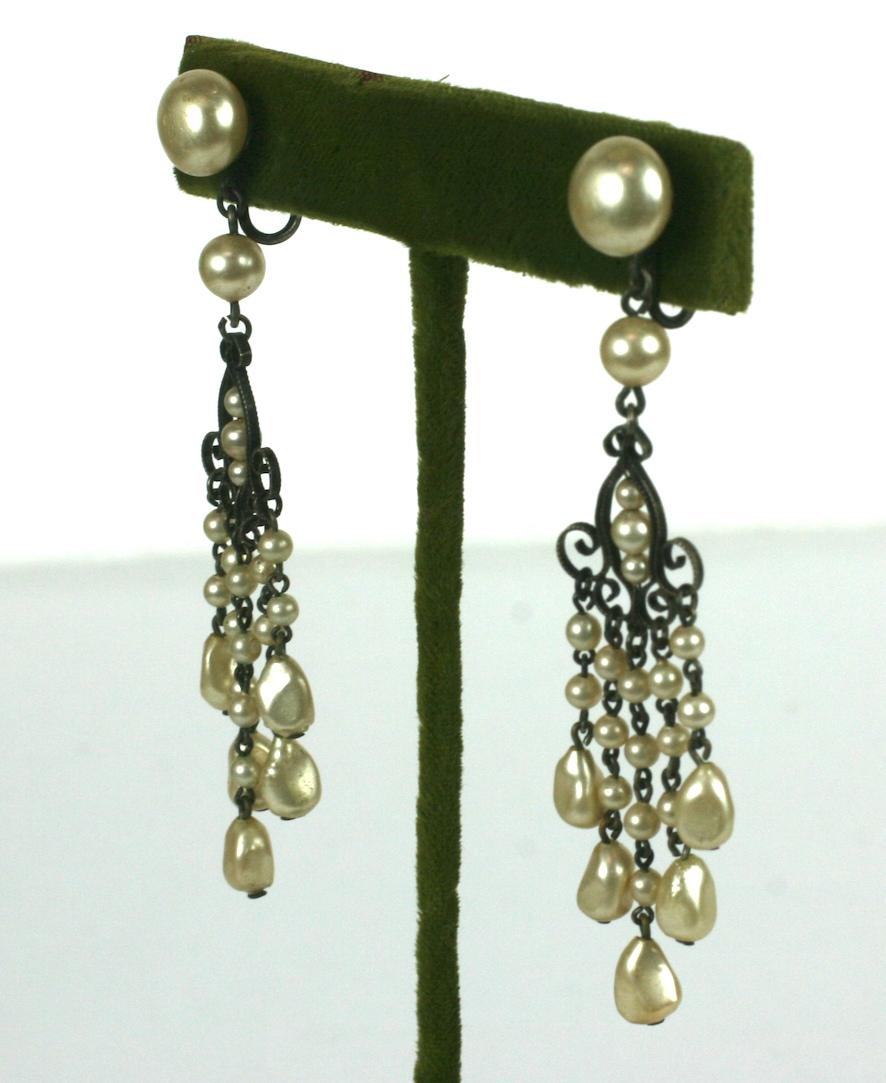 Louis Rousselet Art Deco 1920's earrings with silver gilt metal work and hand made glass long pearl fringe.  
Excellent Condition. Screw back fittings. 
Marked: Made in France
L
W