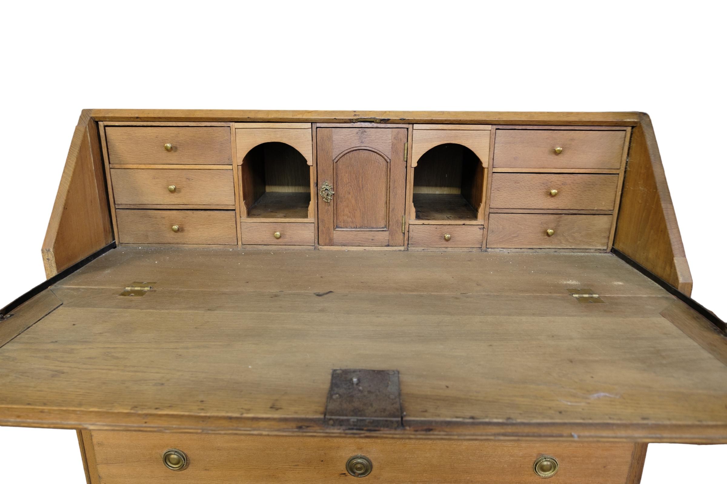 Louis Seize style chatol with 3 drawers made in oak from around 1780.
Measurements in cm: H:108 W:118 D:57