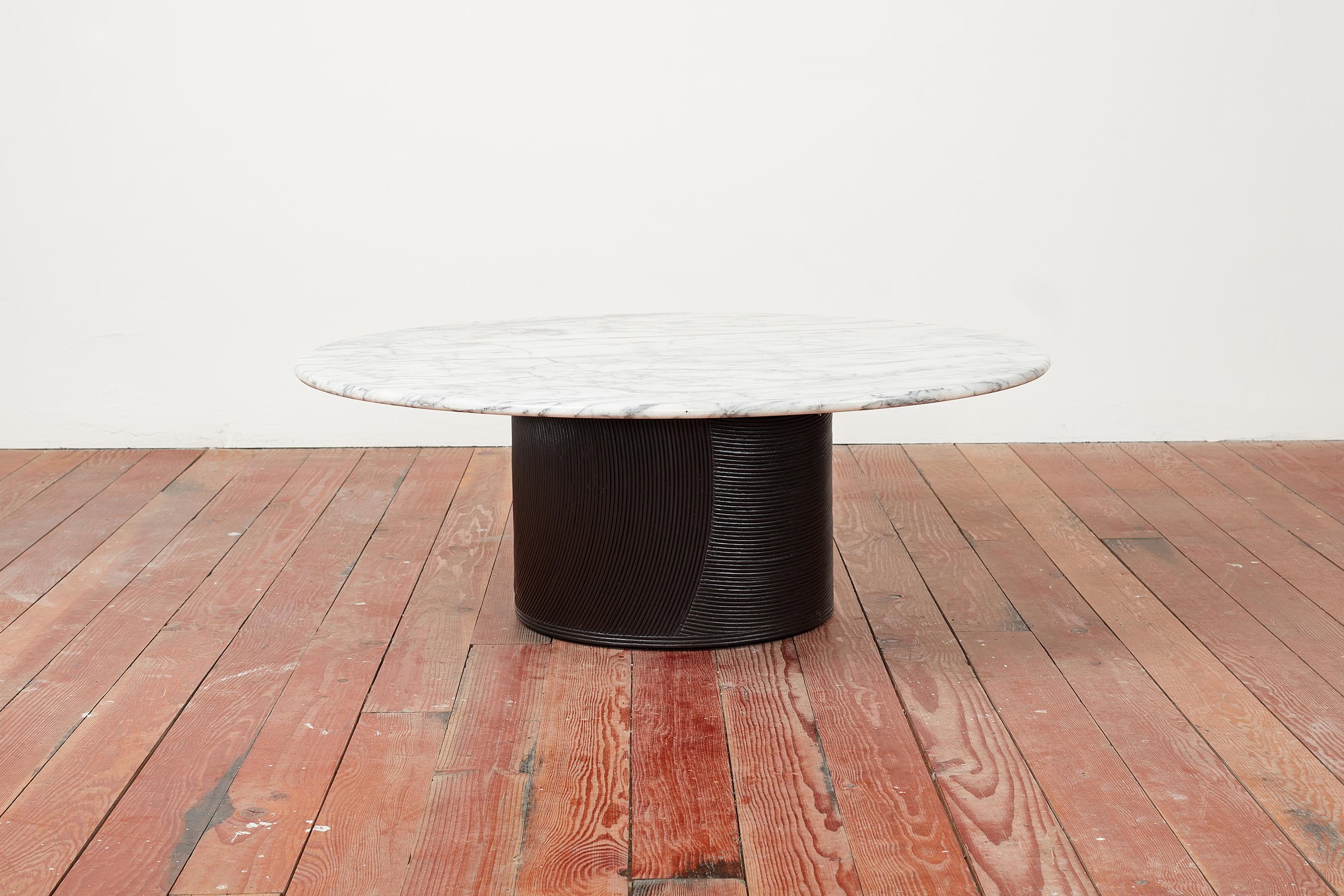 Louis Sognot attributed coffee table with intricate designed bamboo base and Carrara marble top. 
Base has been stained ebony