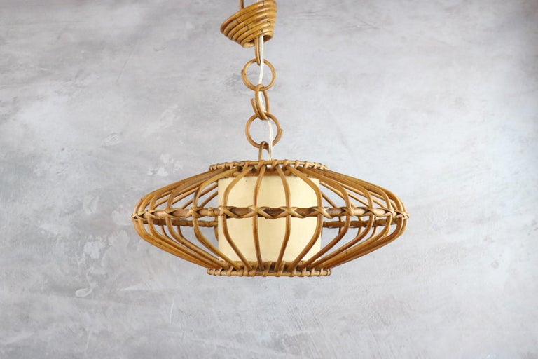 Louis Sognot Bamboo and Rattan Chandelier Mid-Century Modern 1960, France

Very nice pendant light by the French designer Louis Sognot. It is very well made. The artist has created many models using bamboo and rattan for the structure of his