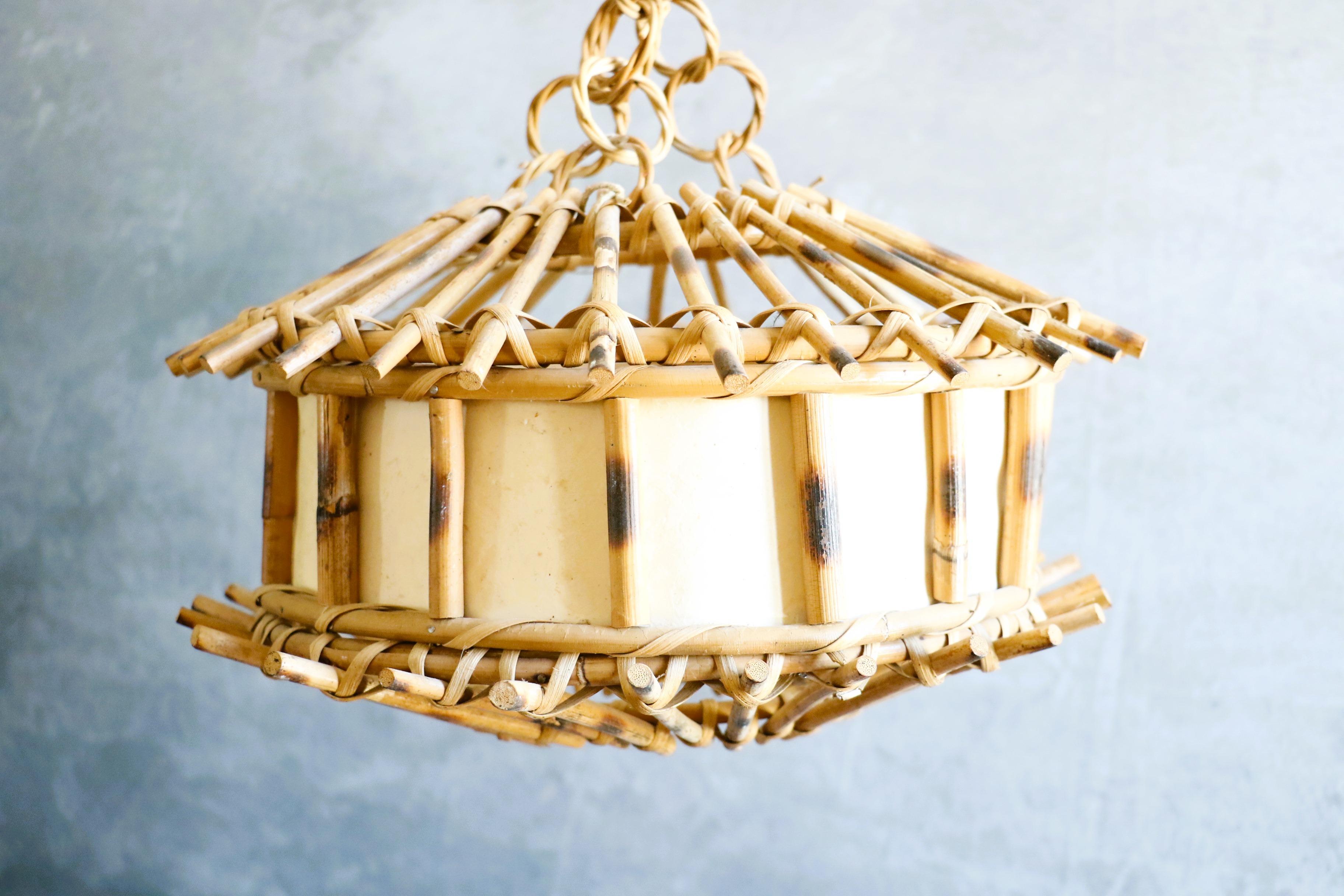 Louis Sognot Bamboo and Rattan Chandelier Mid-Century Modern 1960, France

Very nice pendant light by the French designer Louis Sognot. It is very well made. The artist has created many models using bamboo and rattan for the structure of his lamps,