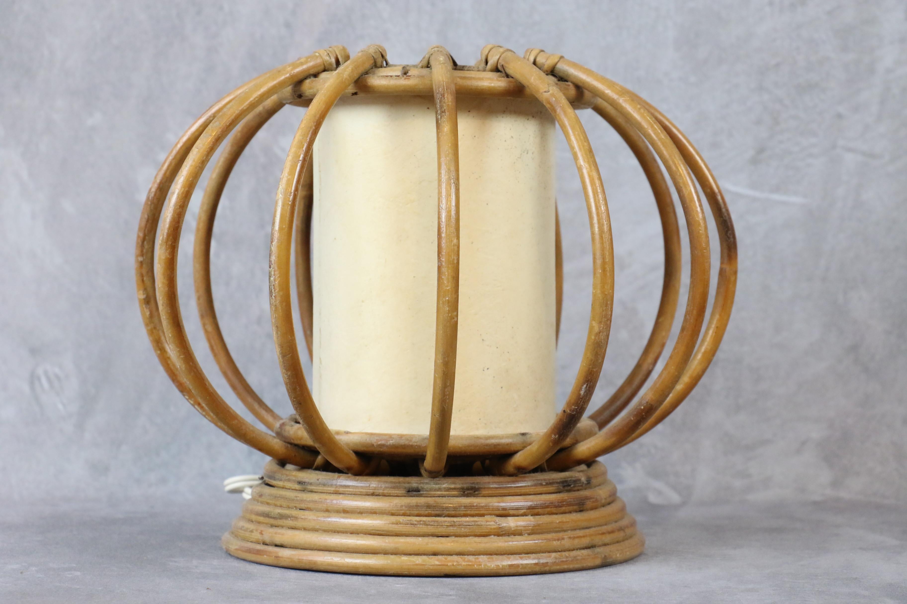 Louis Sognot Bamboo and Rattan Table Lamp Mid-Century Modern 1960, France

Very nice bedside lamp by the French designer Louis Sognot. It is very well made. The artist has created many models using bamboo and rattan for the structure of his