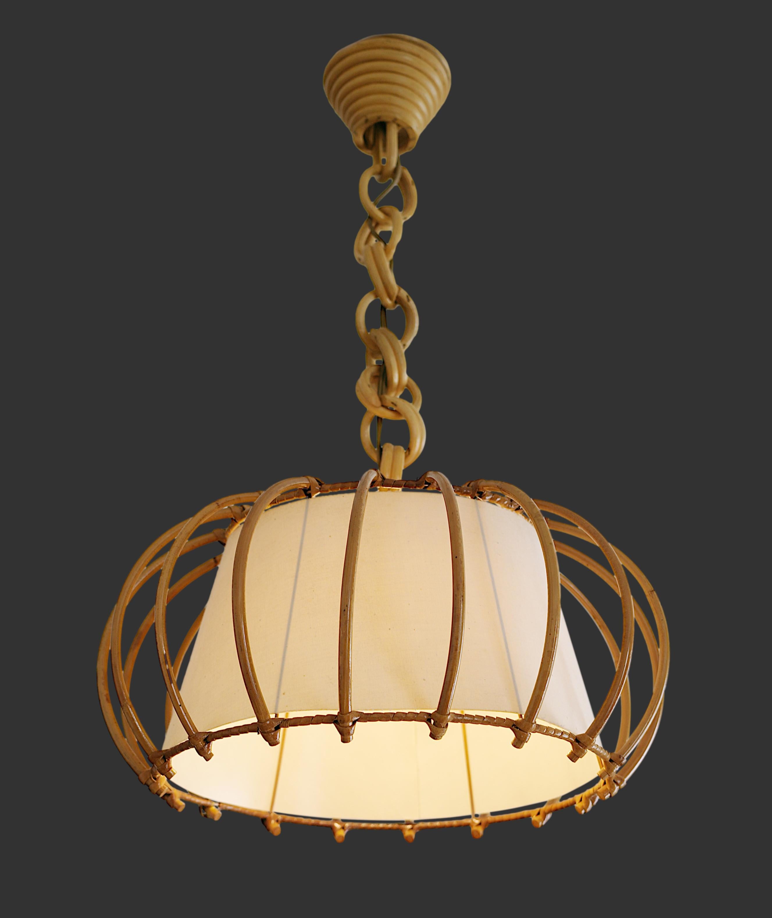 Bamboo pendant  chandelier by Louis SOGNOT, France, 1950s. Bamboo, rattan and fabric. Original shade. Height: 20.5