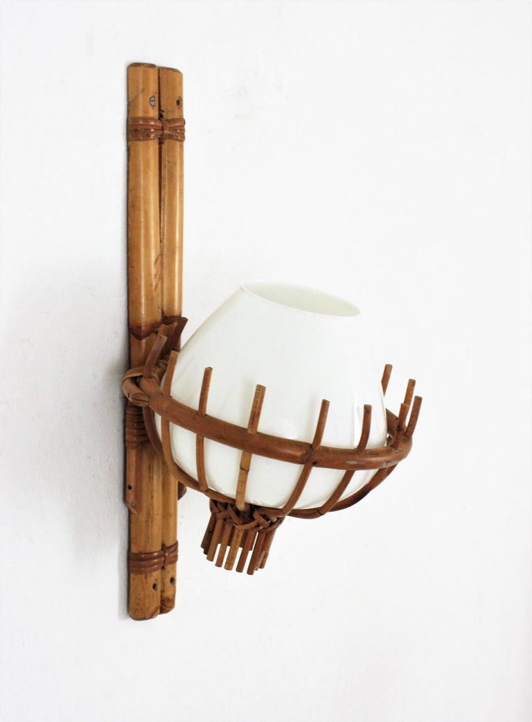 French Louis Sognot Bamboo Rattan Wall Sconce with Milk Glass Globe Shade For Sale