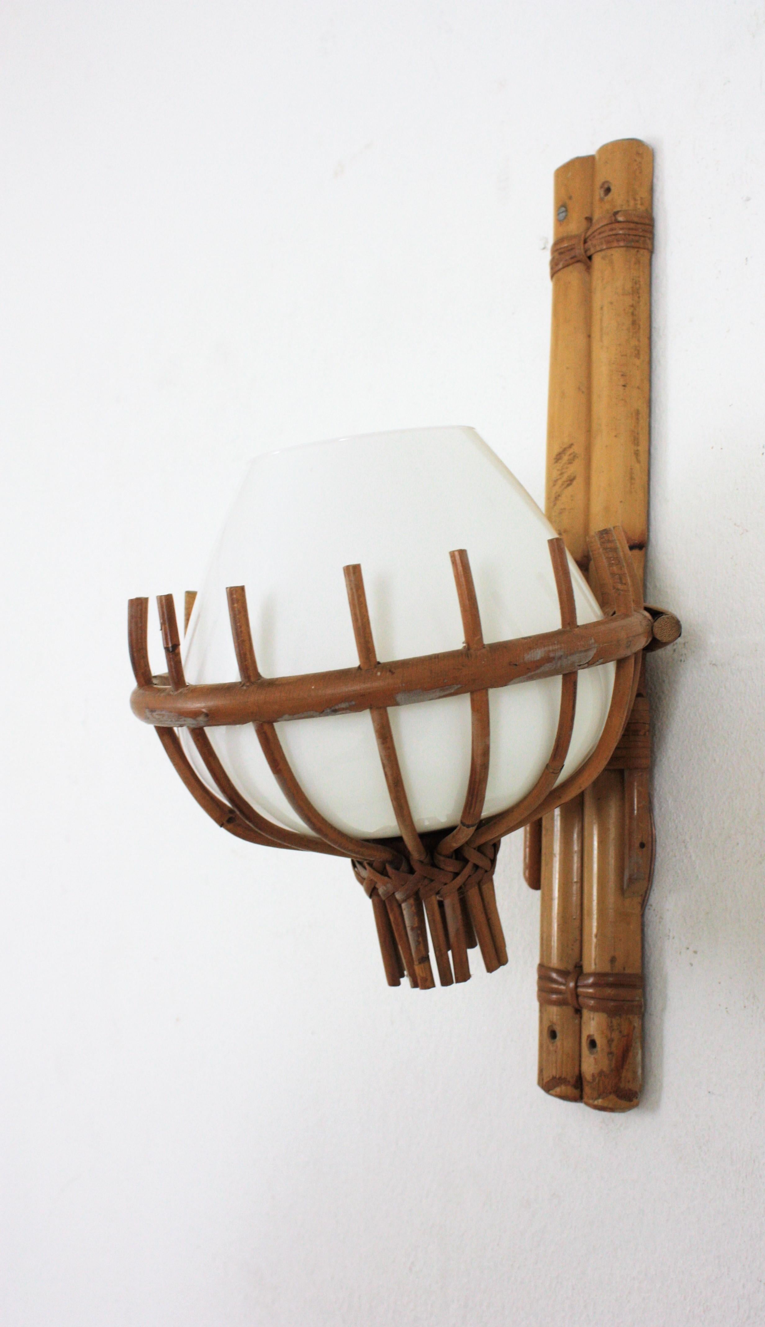 Hand-Crafted Louis Sognot Bamboo Rattan Wall Sconce with Milk Glass Globe Shade For Sale