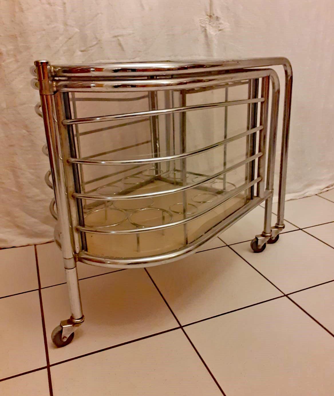 Rare Louis Sognot, nickel-plated trolley with revolving inner cabinet.