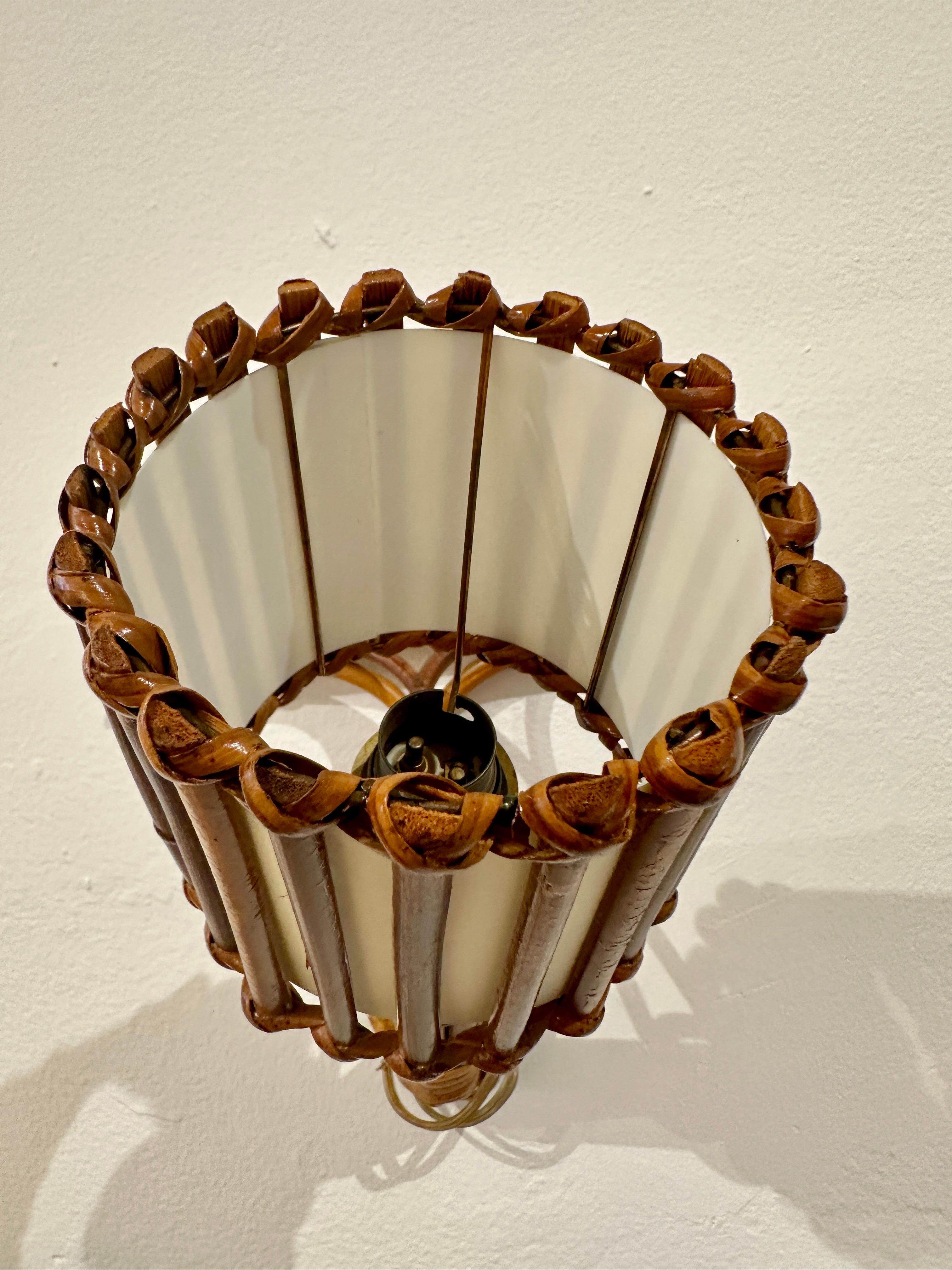 Parchment Paper Louis Sognot Original 1950's French Rattan Wall Sconces, Pair For Sale