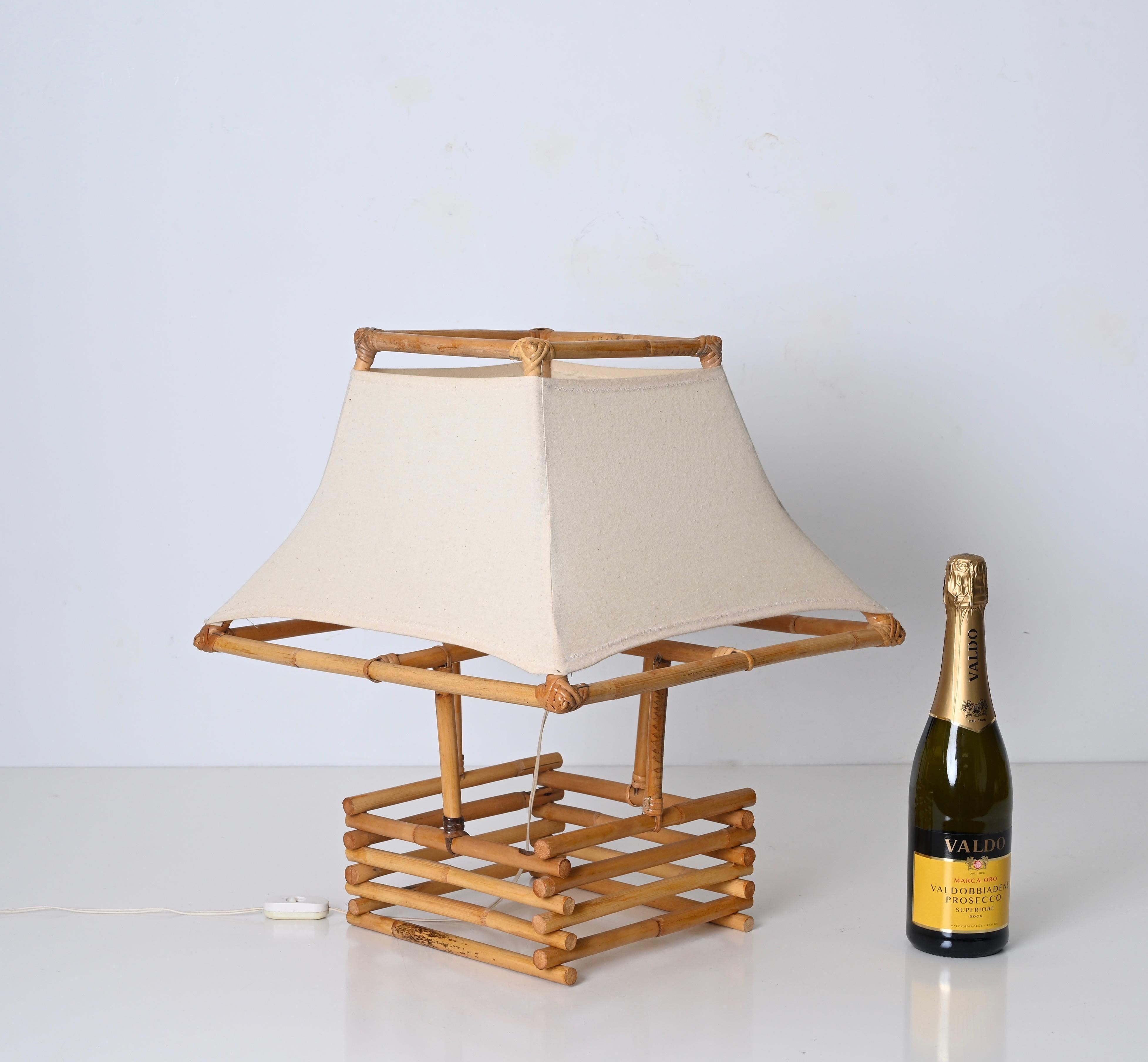 Mid-Century Modern Louis Sognot Rattan, Wicker and White Fabric Table Lamp, France 1960s For Sale