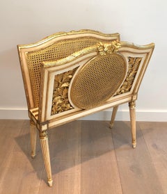 Louis the 16th Style Patinated and Gilded Carved Wood and Caned Magazine Rack