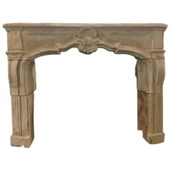 Louis the XIV Limestone Mantel carved Shell decor, circa 18th Century