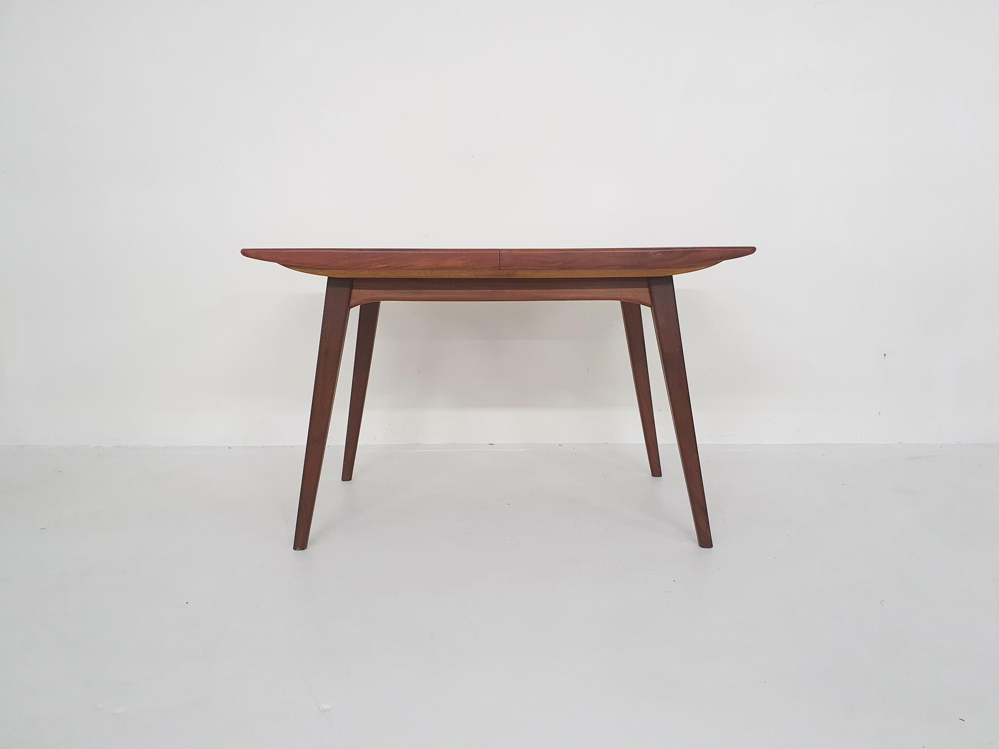 Teak dining table by Louis van Teeffelen for Webe.
Table can be extended from 120 till 155 cm
Louis van Teeffelen was the most important designer at Wébé. His work was often influenced by Danish mid century modern. Like Danish designs of the same