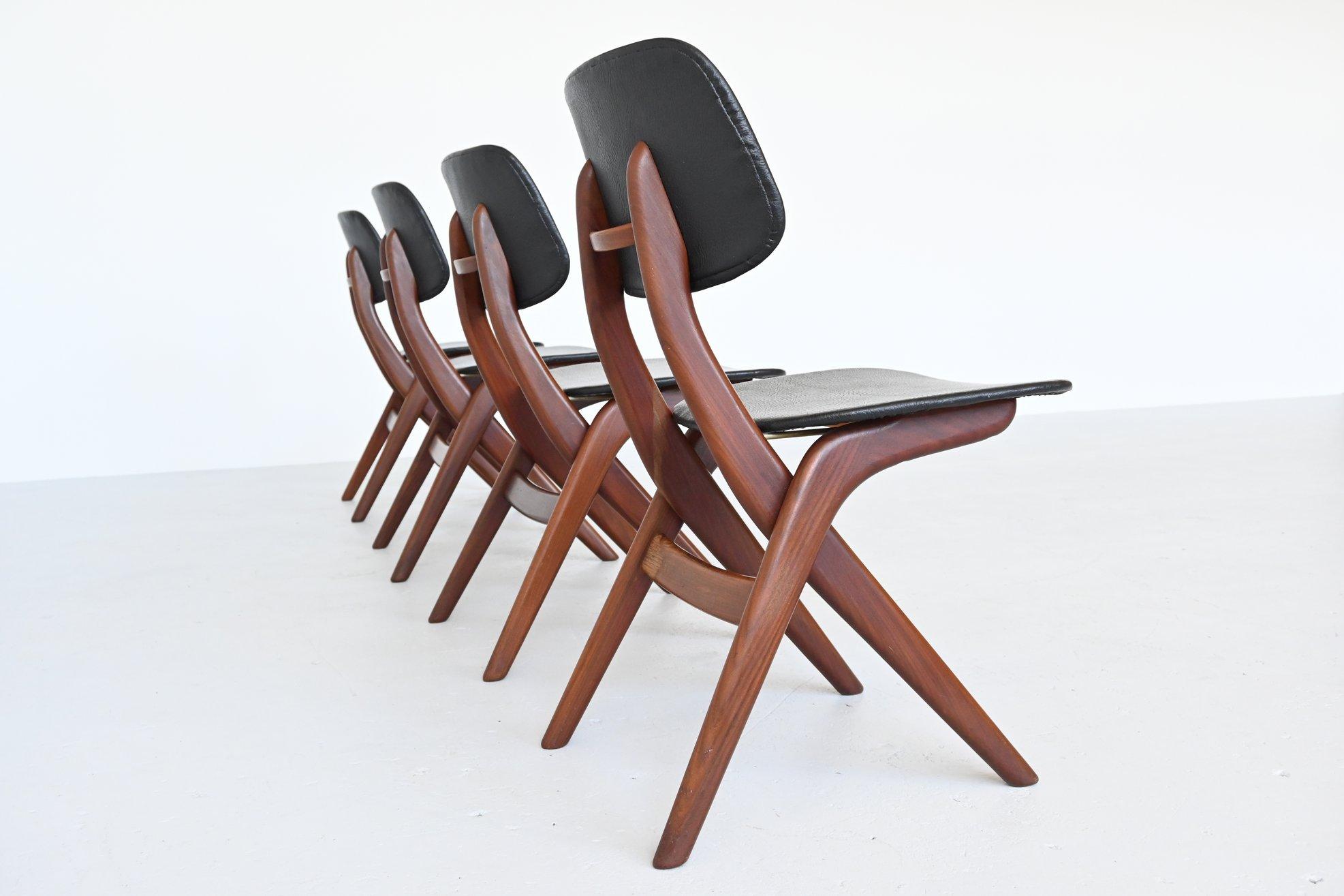 Very nicely shaped Pelican chairs designed by Louis Van Teeffelen for Wébé, The Netherlands 1960. The chairs are made of solid teak wood and has black original faux leather upholstery. They seat very comfortable and give good support in the