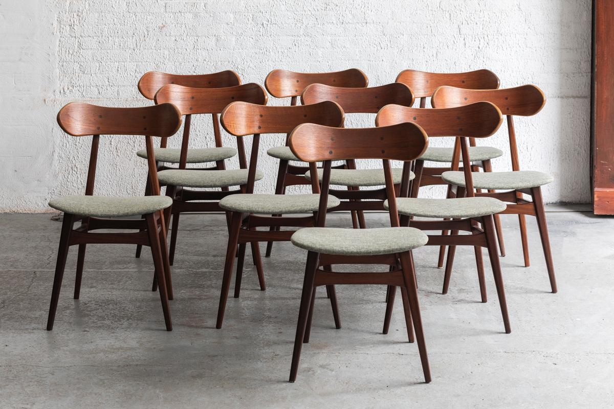 Set of 10 dining chairs, model Kastrup, designed by Louis van Teeffelen and produced by Wébé in the Netherlands around 1960. This set of 10 features a solid teak frame, new foam and fabric and organic shaped backrest for extra comfort. In good