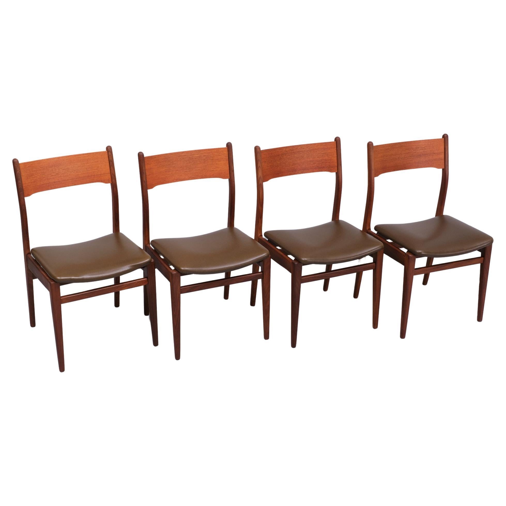 Very nice set of 4 Dining chairs . Solid Teak ,comes with a Brown Faux Leather 
upholstery .Beautiful organic shaped .1960s Holland  .Good condition .
Also for sale the Matching dining table , see photos .