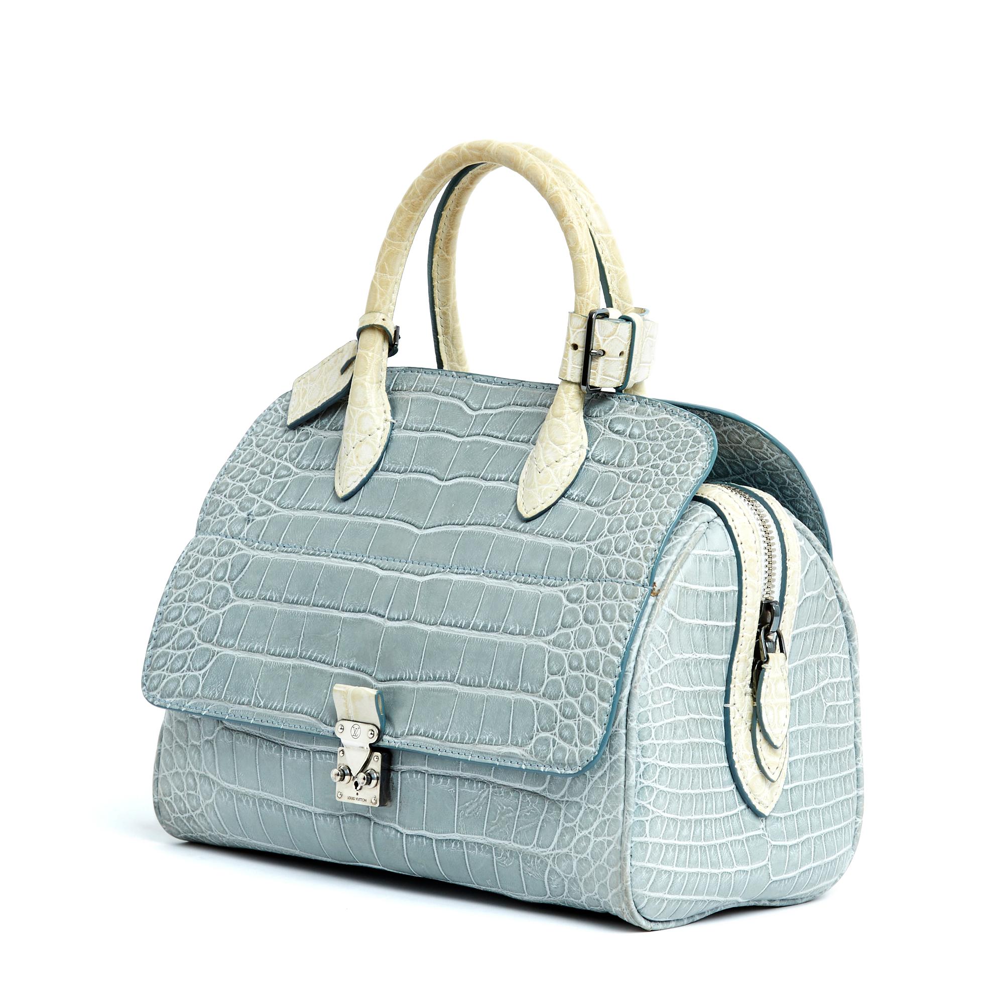 Louis Vuitton Old Speedy Flap model bag from the Les Extraordinaires 2012 collection sold in a very limited edition (3 colors, 10 of each color), in soft exotic leather in light blue color (