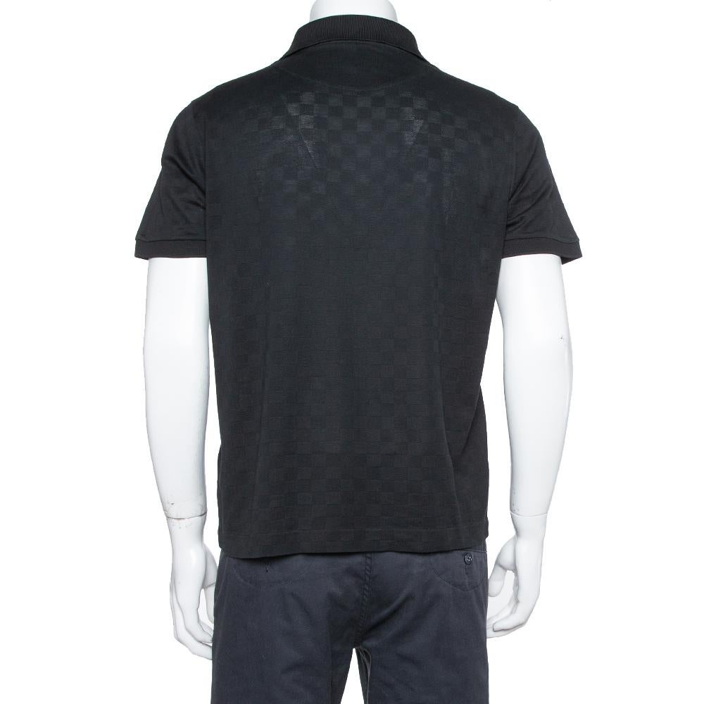 Bring the design of this Louis Vuitton polo t-shirt into your casual wear and flaunt it with jeans and pants. It comes in a classic black hue with short sleeves, front buttons, and Damier patterns. Made from cotton, this shirt exudes style as well