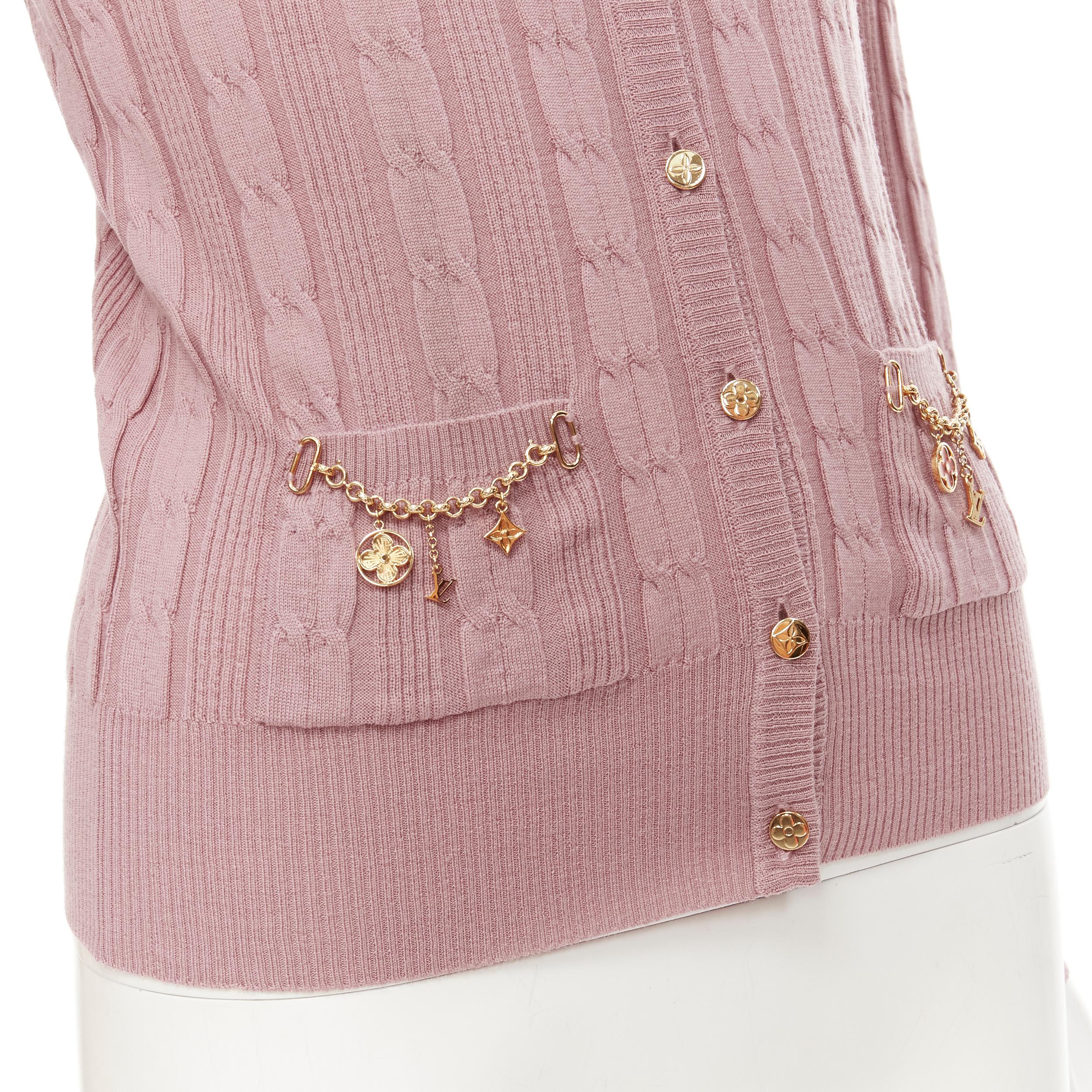 LOUIS VUITTON 100% wool pink cable knit gold floral charm chain trim cardigan XS 
Reference: LNKO/A01953 
Brand: Louis Vuitton 
Material: Wool 
Color: Pink 
Pattern: Solid 
Closure: Button 
Extra Detail: Cable knit fine-knit design. Gold-tone logo