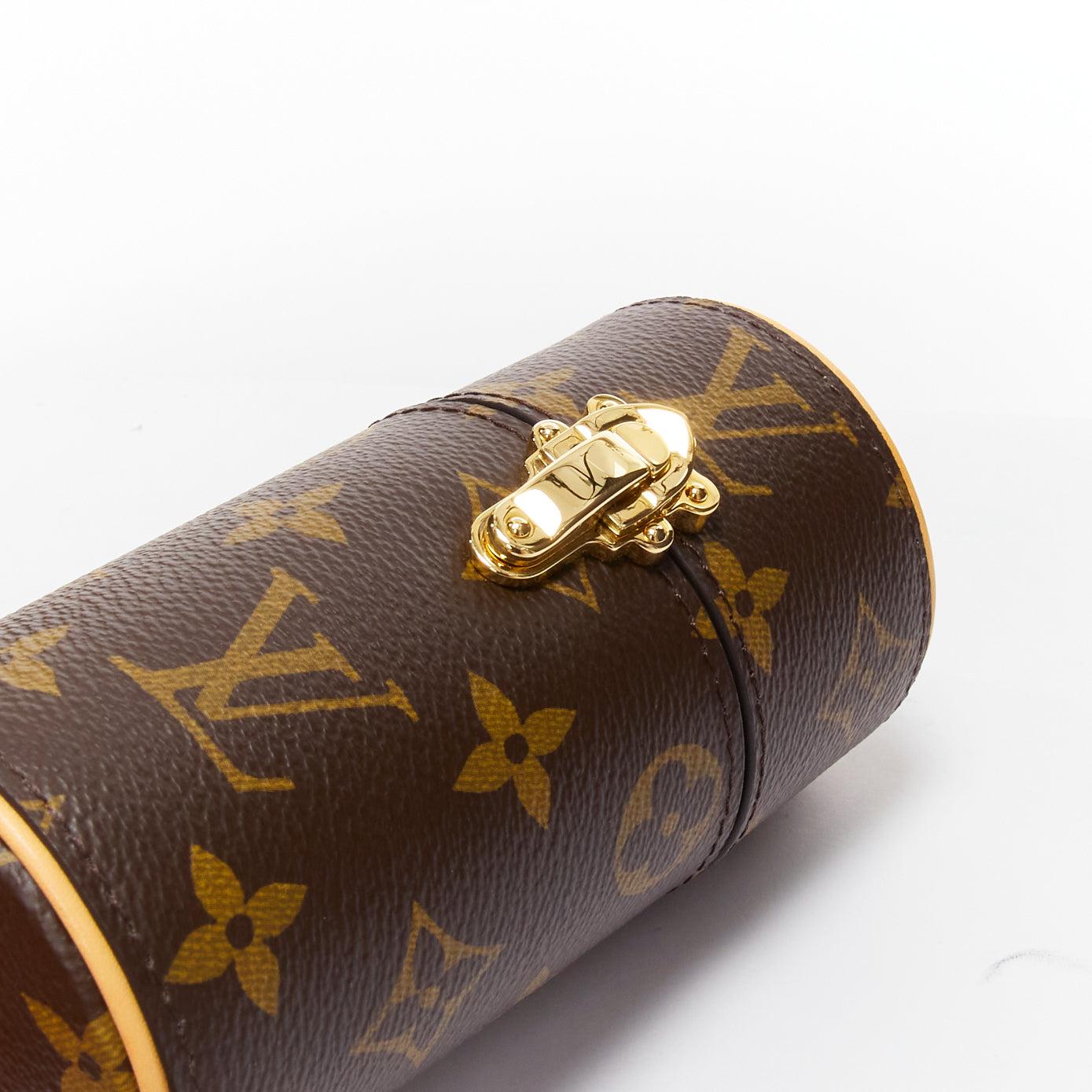 LOUIS VUITTON 100ml Perfume Travel Case brown LV logo canvas
Reference: TGAS/D00628
Brand: Louis Vuitton
Model: 100ml Perfume Case
Material: Canvas, Leather
Color: Brown
Pattern: Monogram
Closure: Clasp
Lining: Nude Leather
Extra Details: This is a