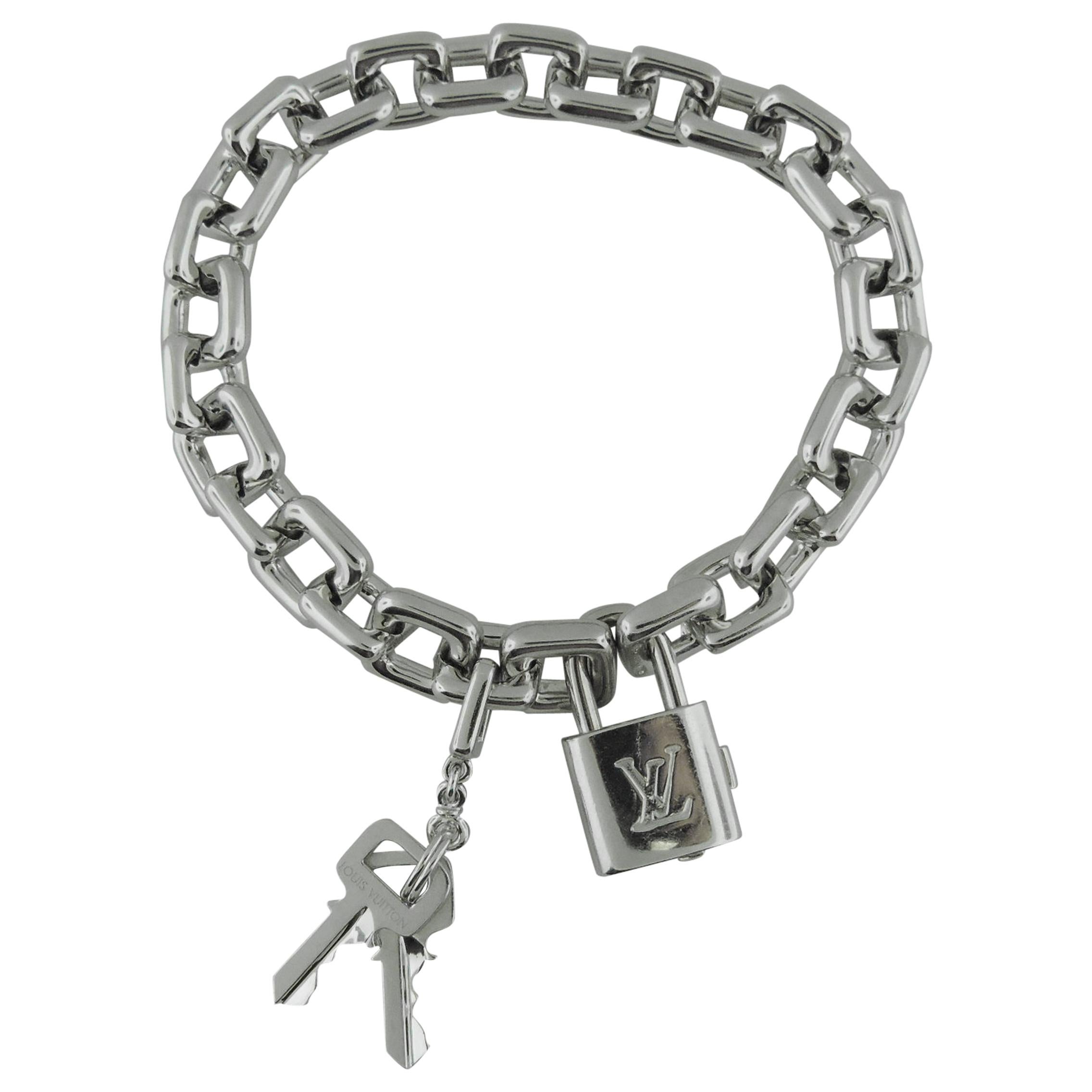 Louis Vuitton 18 Karat White Gold "Pad Lock and Keys Charm Bracelet For Sale