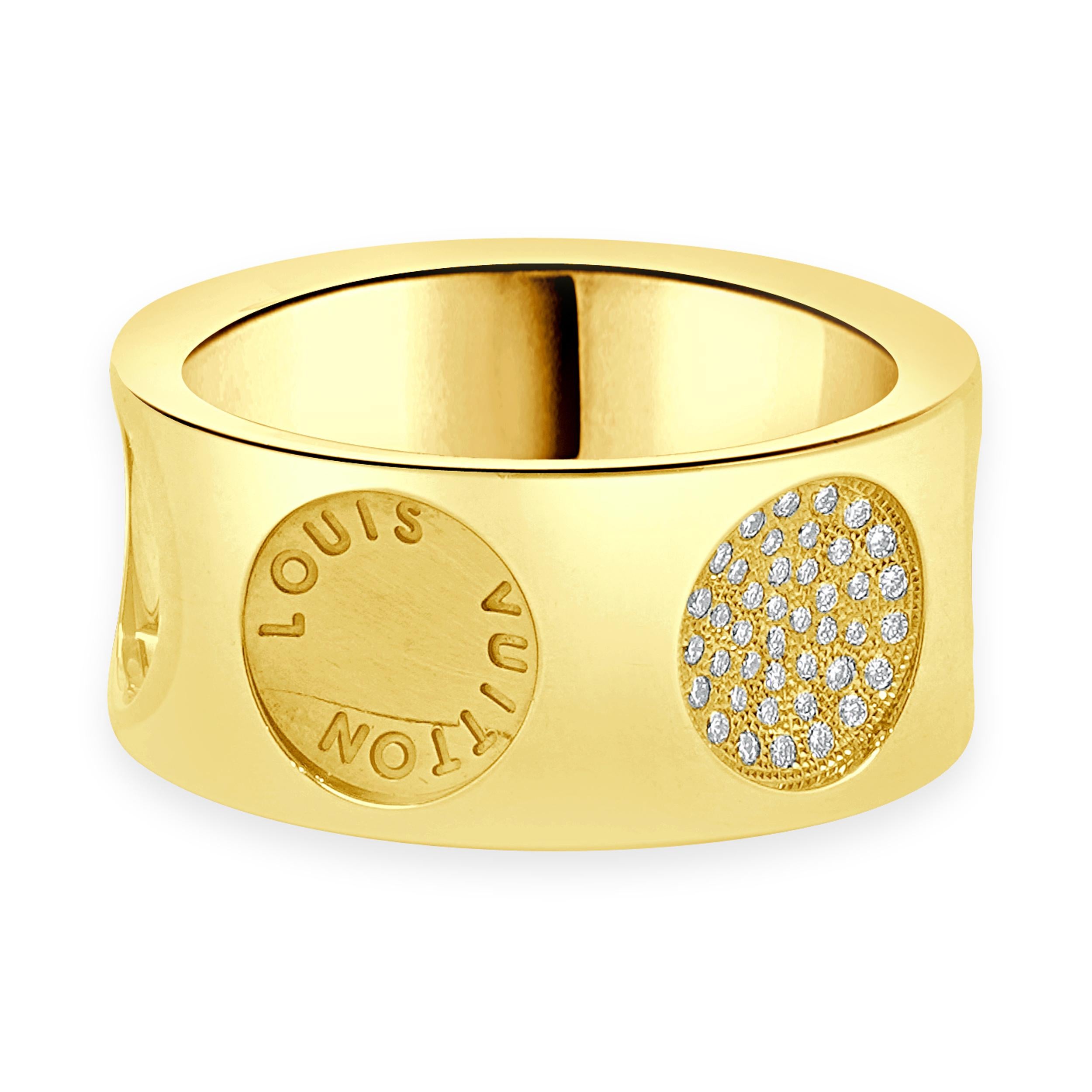 Designer: Louis Vuitton
Material: 18K yellow gold
Diamond: round brilliant cut = 0.20cttw
Color: F/G
Clarity: VS1-2
Dimensions: ring top measures 10mm wide
Size: 7.75
Weight: 16.34 grams
