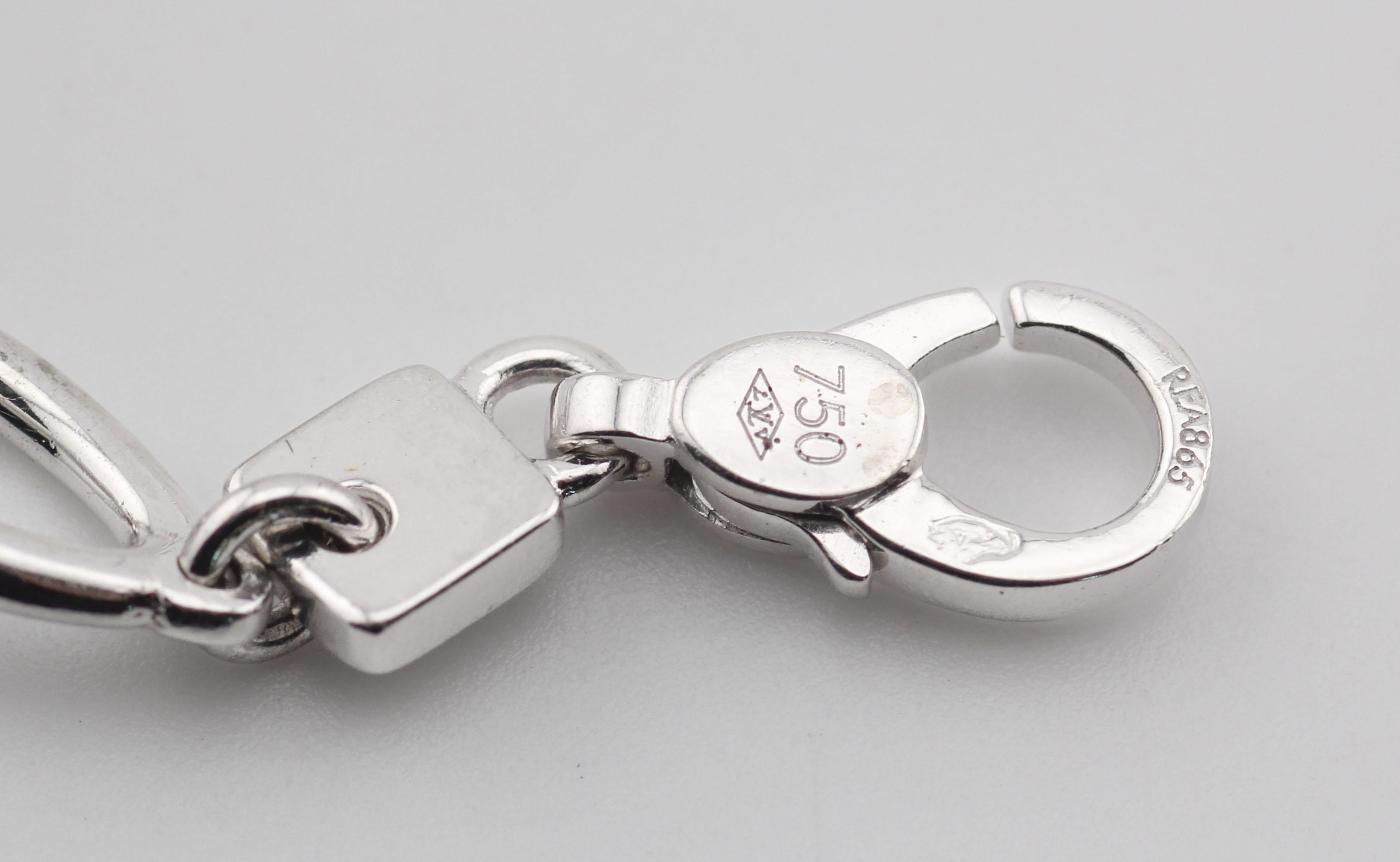 Pulsera Louis Vuitton de oro blanco de 18 quilates con dijes en venta 1