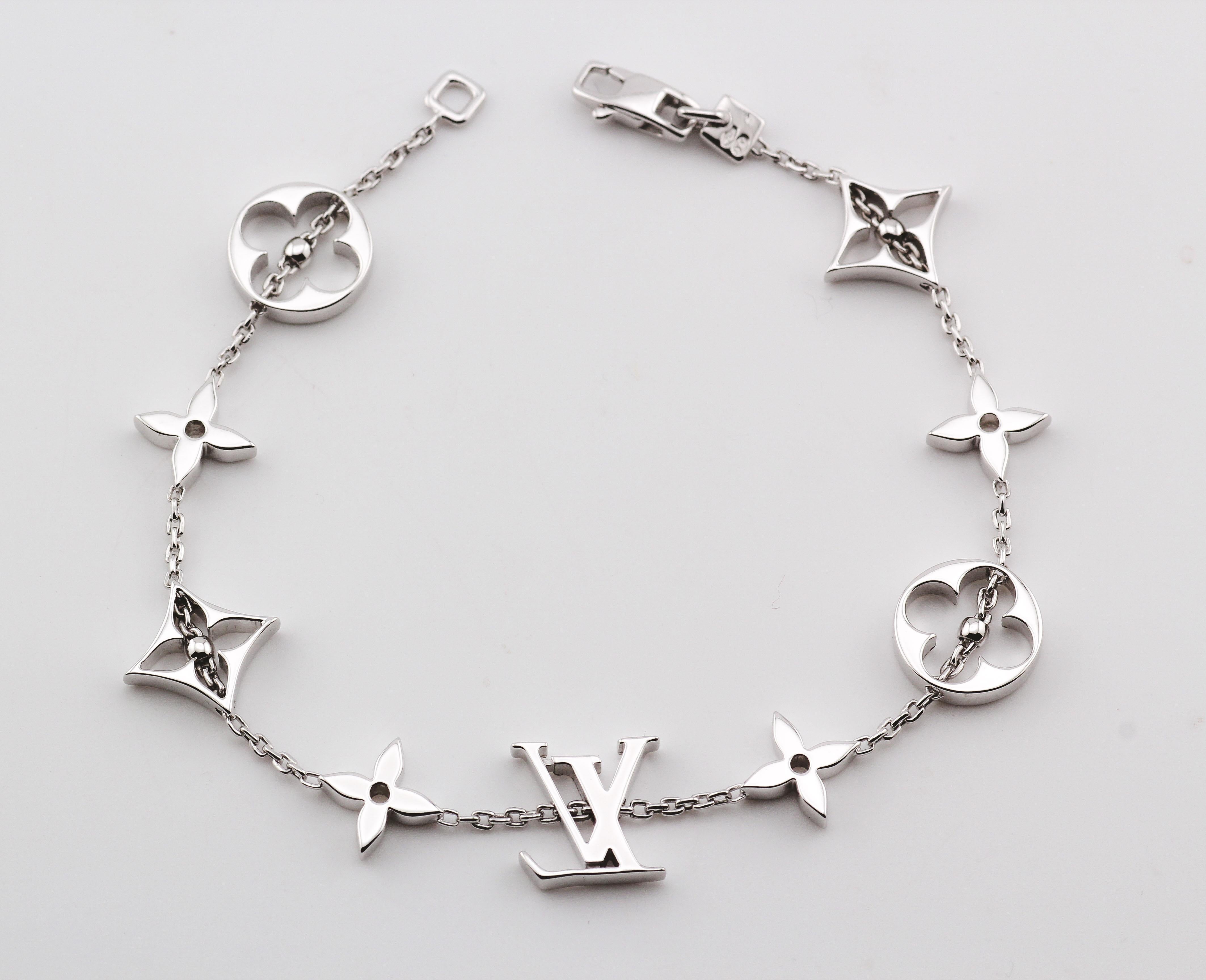 A sophisticated and elegant creation, the Louis Vuitton 18K White Gold Bracelet is a testament to luxury and refined craftsmanship. This exquisite piece showcases a harmonious blend of iconic motifs and sleek design.

Crafted in 18K white gold, the