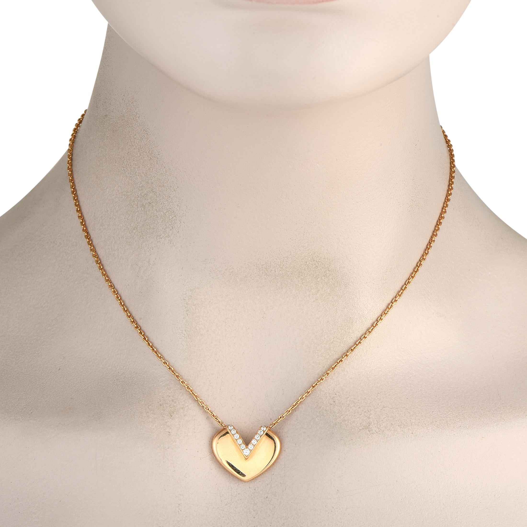 The V Heart necklace by Louis Vuitton blends refined sophistication with playful charm. It features a yellow gold chain measuring 16 long and a heart-shaped pendant measuring 0.70 by 0.75. The Maisons iconic V motif is traced with 0.14 ct diamonds,