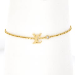 Louis Vuitton Bracelet à maillons câbles en or jaune 18 carats avec lunette et diamants monogrammes