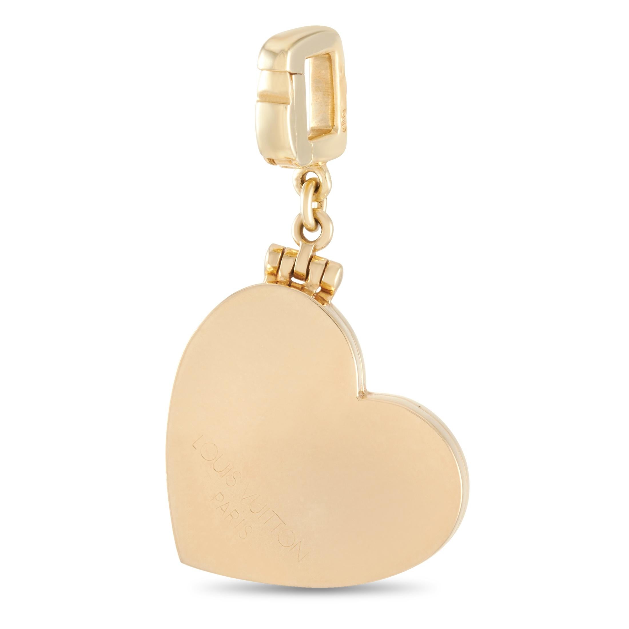 This Louis Vuitton heart locket charm pendant is made of 18K yellow gold and weighs 14.7 grams. It measures 1.50” in length and 0.75” in width.
 
 The pendant is offered in estate condition and includes the manufacturer’s box.