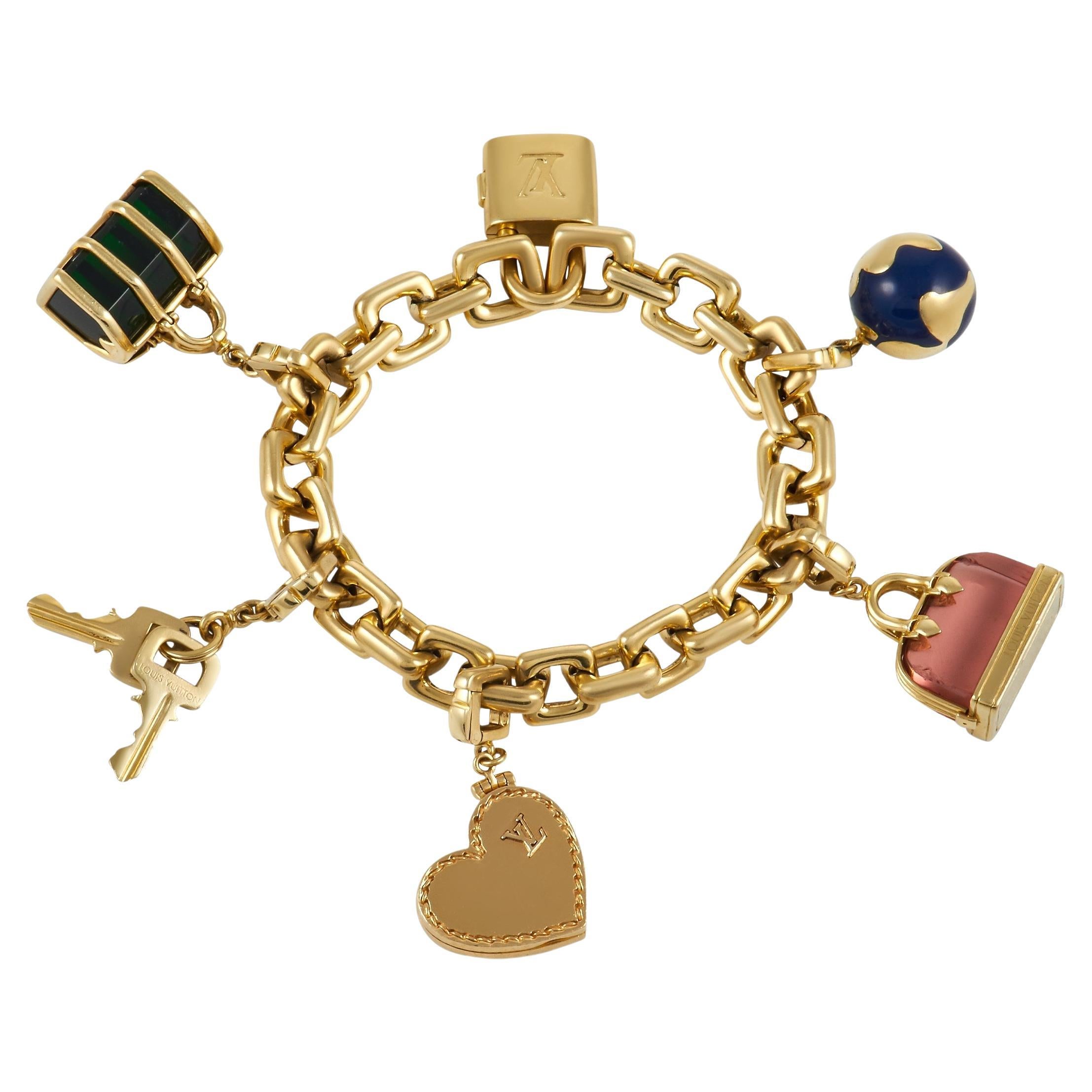 Louis Vuitton 18K Yellow Gold World Travel Charm Bracelet with Lock, Key  and Twelve Diamond, Onyx, L…
