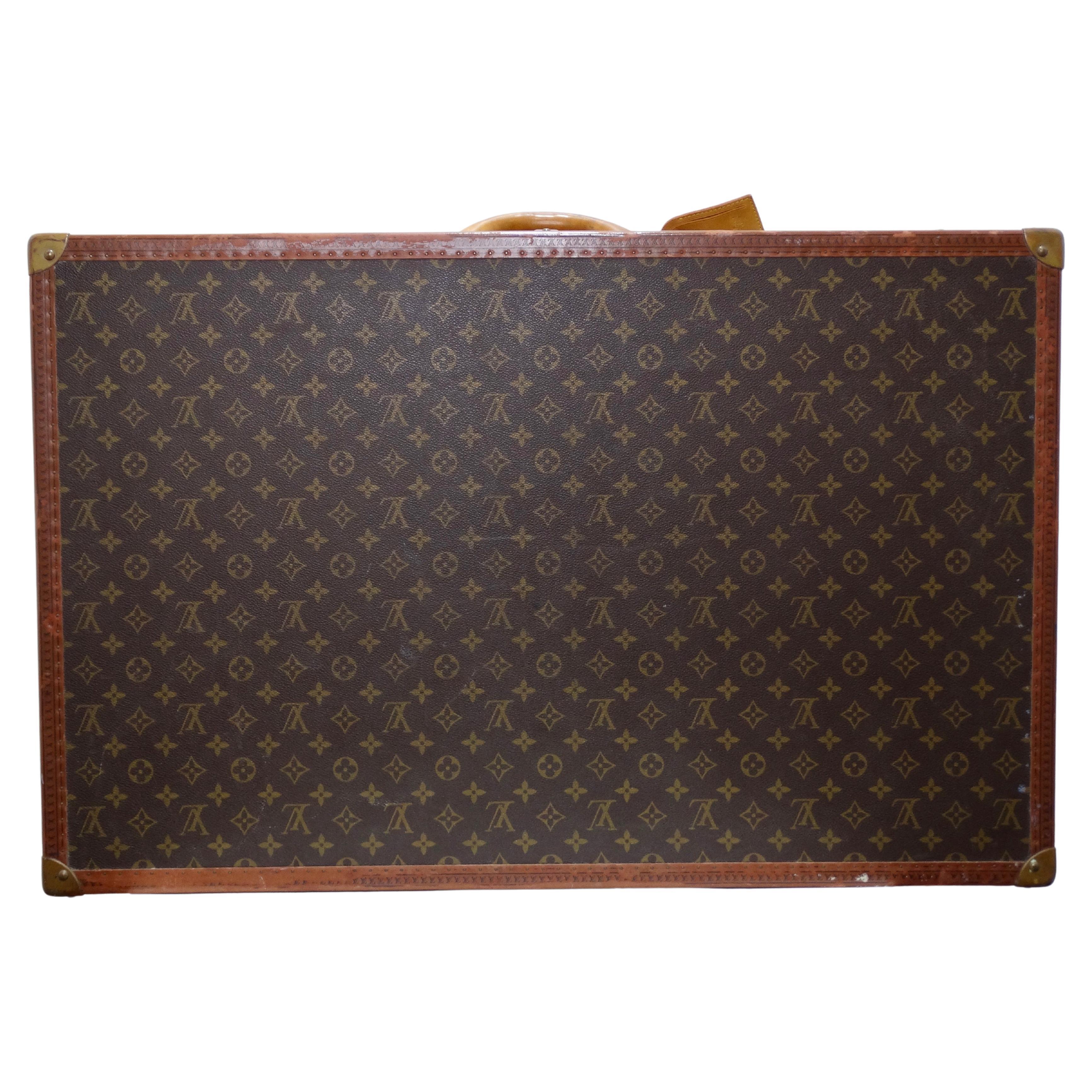This is an amazing vintage find! Nothing is better than vintage Louis Vuitton because the brown leather ages beautifully and only gets better! This is a charming Louis Vuitton hard-sided case from the mid to late 20th century. This suitcase is in