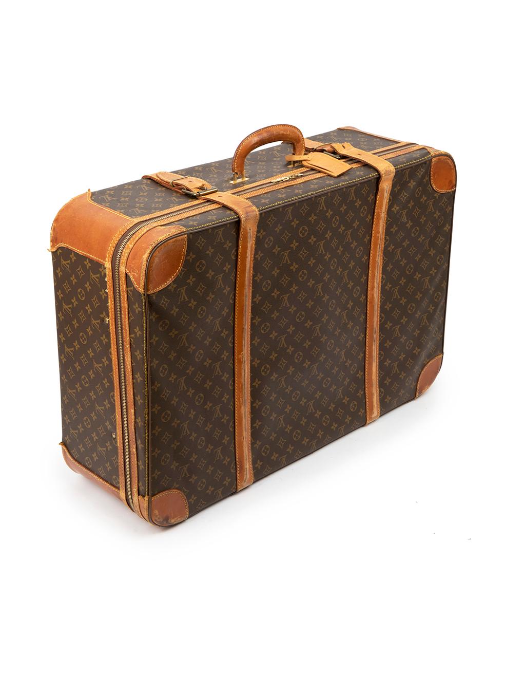 CONDITION is Good. General wear to suitcase is evident. Moderate signs of wear seen throughout to the leather at the sides, front and back with discoloured marks, abrasions and scratches, as well as one strap having broken. The stitching at the