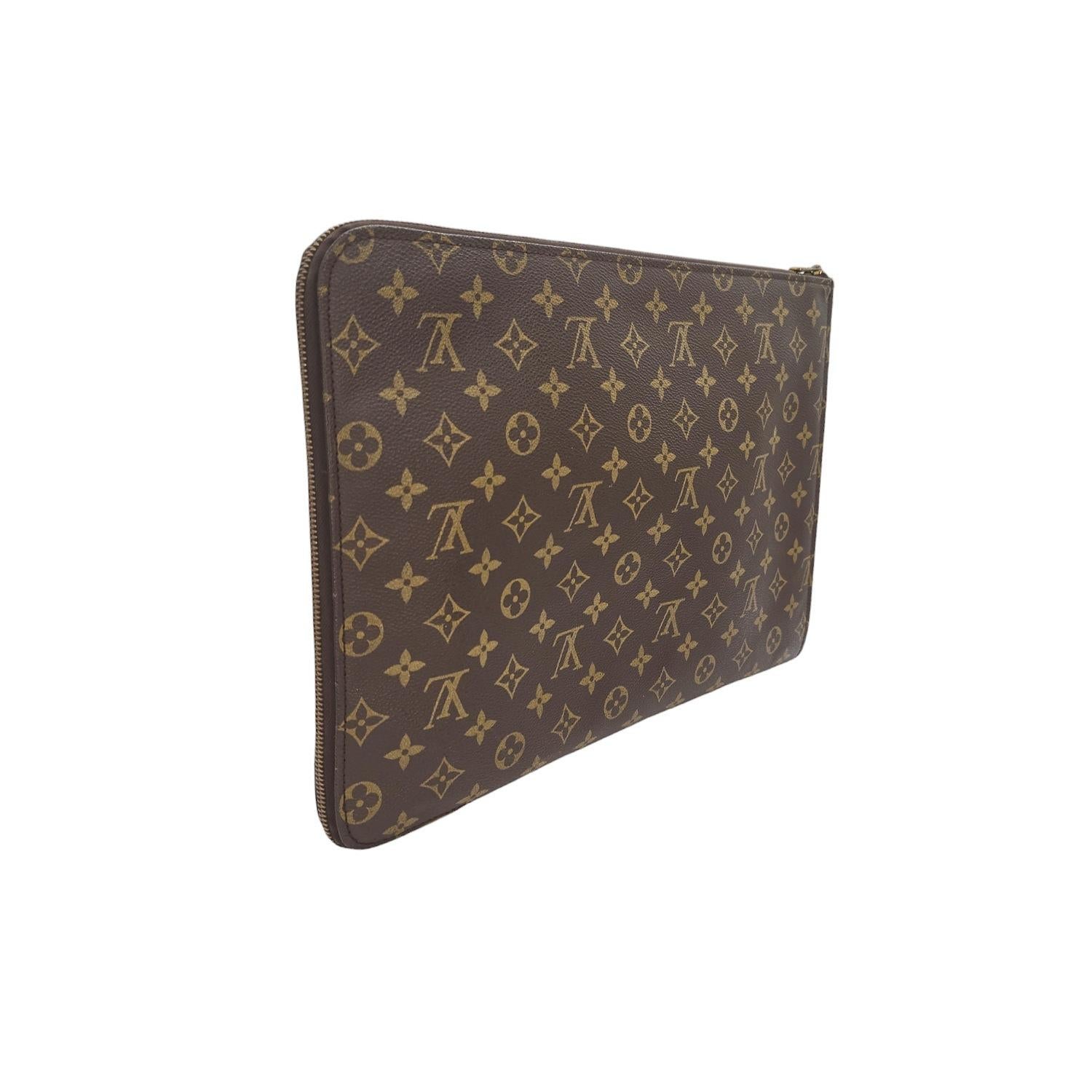 Elevate your professional style with the Louis Vuitton Vintage Monogram Canvas Poche Documents Portfolio. This stylish case is finely crafted of classic Louis Vuitton monogram on toile canvas. The case features a brass zipper that opens to a