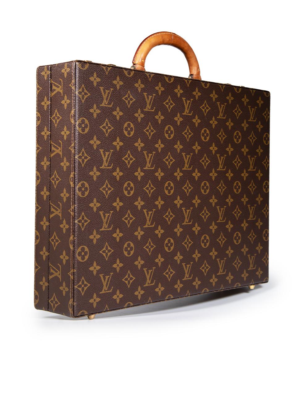 CONDITION is Good. Minor wear to breifcase is evident. The handle is discoloured. All hardware is tarnished and has surface abrasions. The feet have abrasions and are discoloured. The inside lining has some spotting of discolouration and there is a