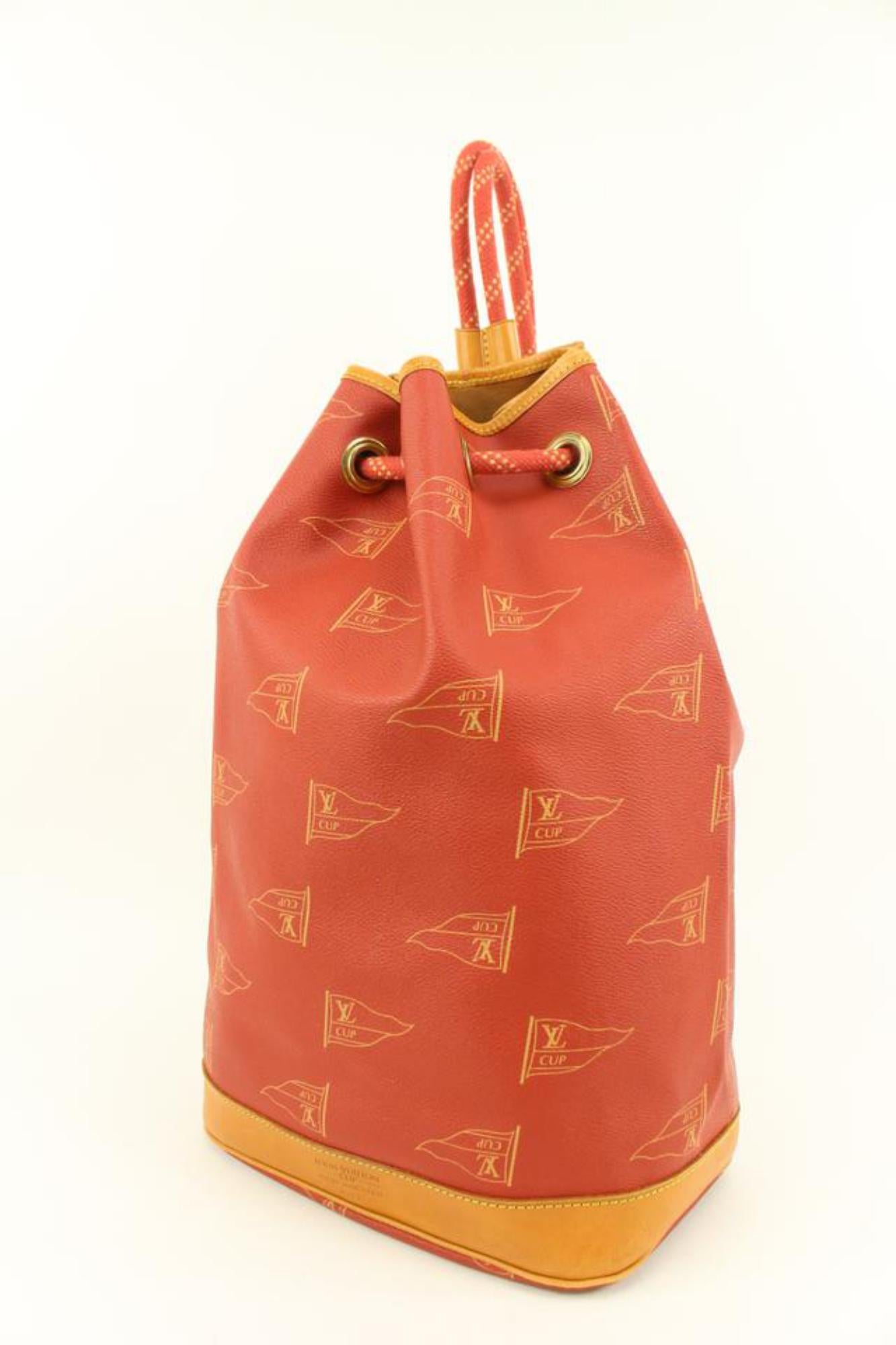 Louis Vuitton 1995 Red LV Cup Saint Tropez Drawstring Bucket Hobo Bag 63lk38s
Date Code/Serial Number: SP0974
Made In: France
Measurements: Length:  16