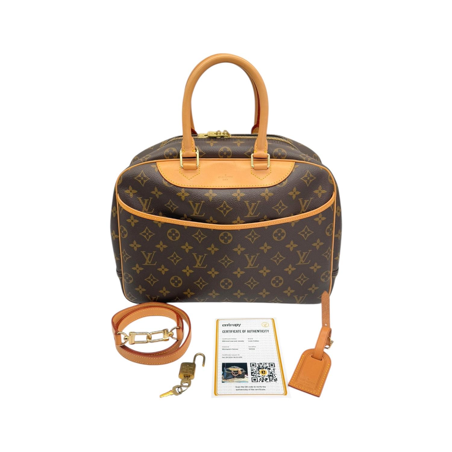 Introducing the timeless and iconic Louis Vuitton Monogram Deauville Vintage Bag! Crafted with the finest brown coated canvas and leather trim, its spacious interior and multiple pockets make it perfect for everyday use. With its adjustable strap