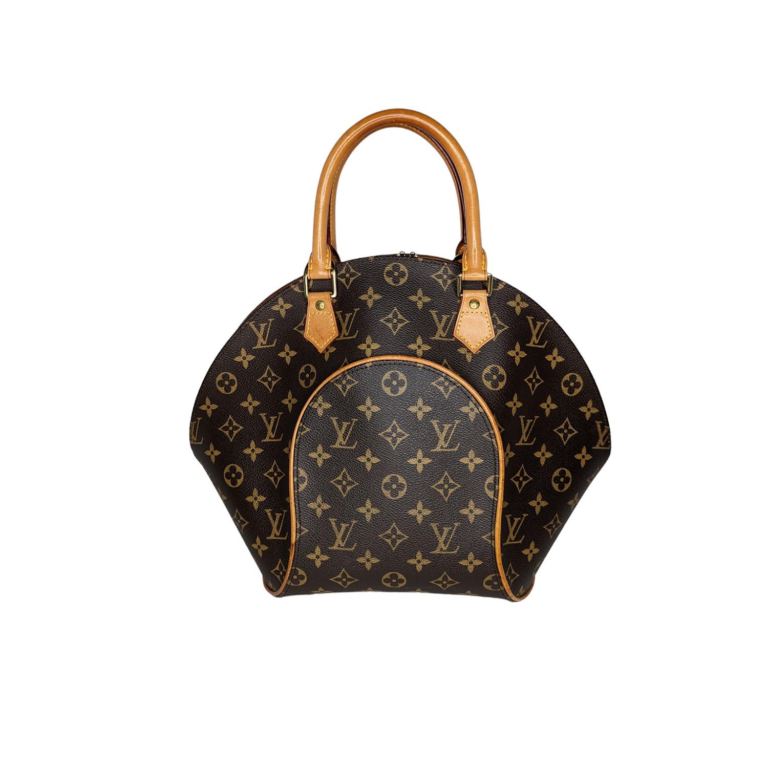 Louis Vuitton Monogram Ellipse MM. This is a chic vintage bowling style tote that is crafted of traditional Louis Vuitton monogram toile canvas. The bag features vachetta cowhide leather piping and strong durable handles with polished brass hardware
