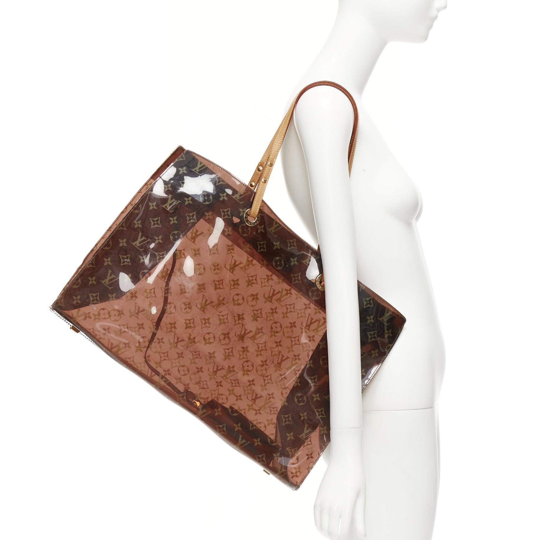 LOUIS VUITTON 2000 Cabas Cruise brown LV monogram PVC vinyl tote bag pouch
Reference: NKLL/A00246
Brand: Louis Vuitton
Model: Cabas
Material: Leather, PVC
Color: Brown, Beige
Pattern: Monogram
Lining: Beige Leather
Extra Details: Honey leather base