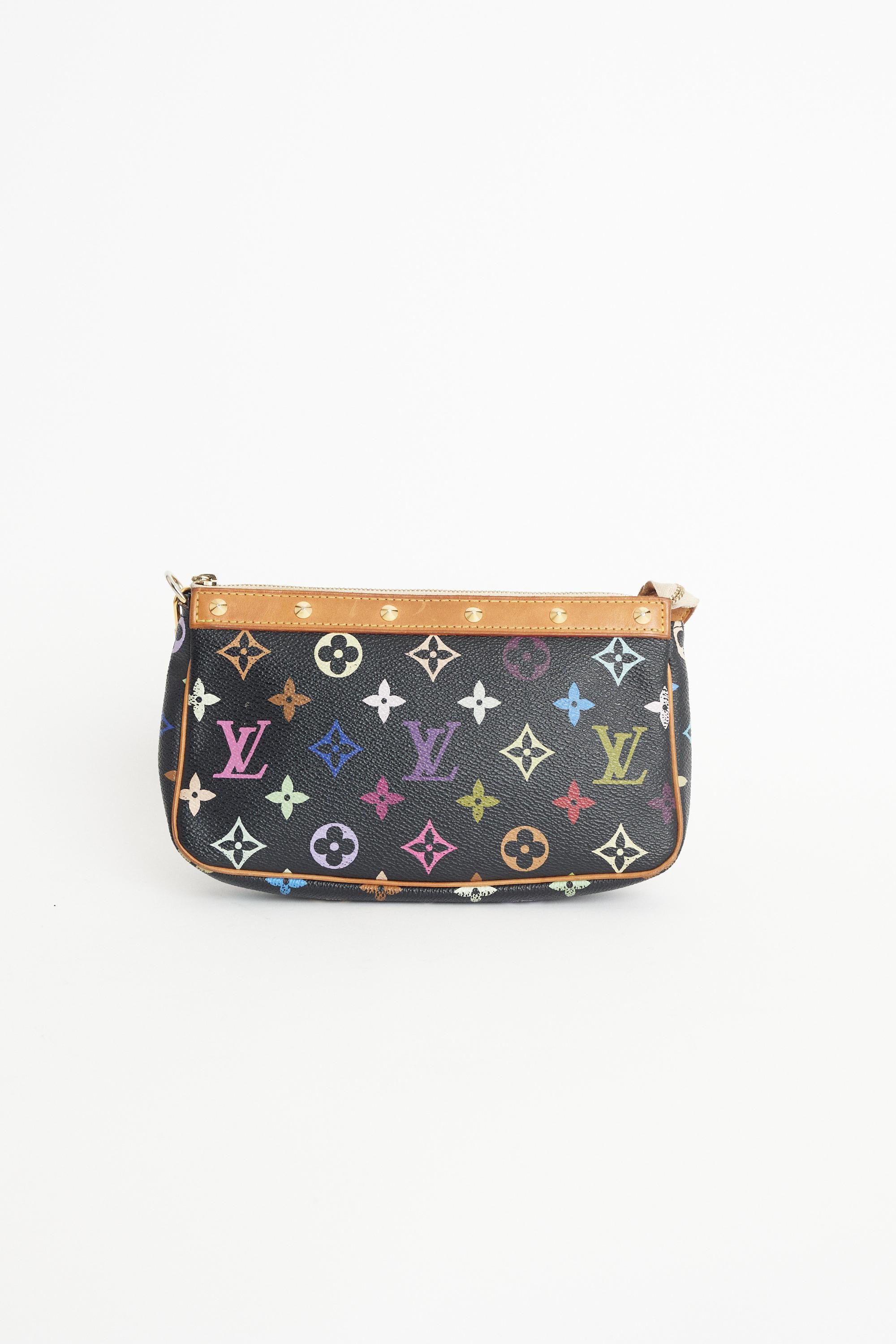 We are excited to present this iconic Louis Vuitton x Takashi Murakami 2003 black pochette bag. Features monogram print, zip closure and studding on the strap. In excellent vintage condition. Authenticity guaranteed.

Fabric: Leather
Dustbag: