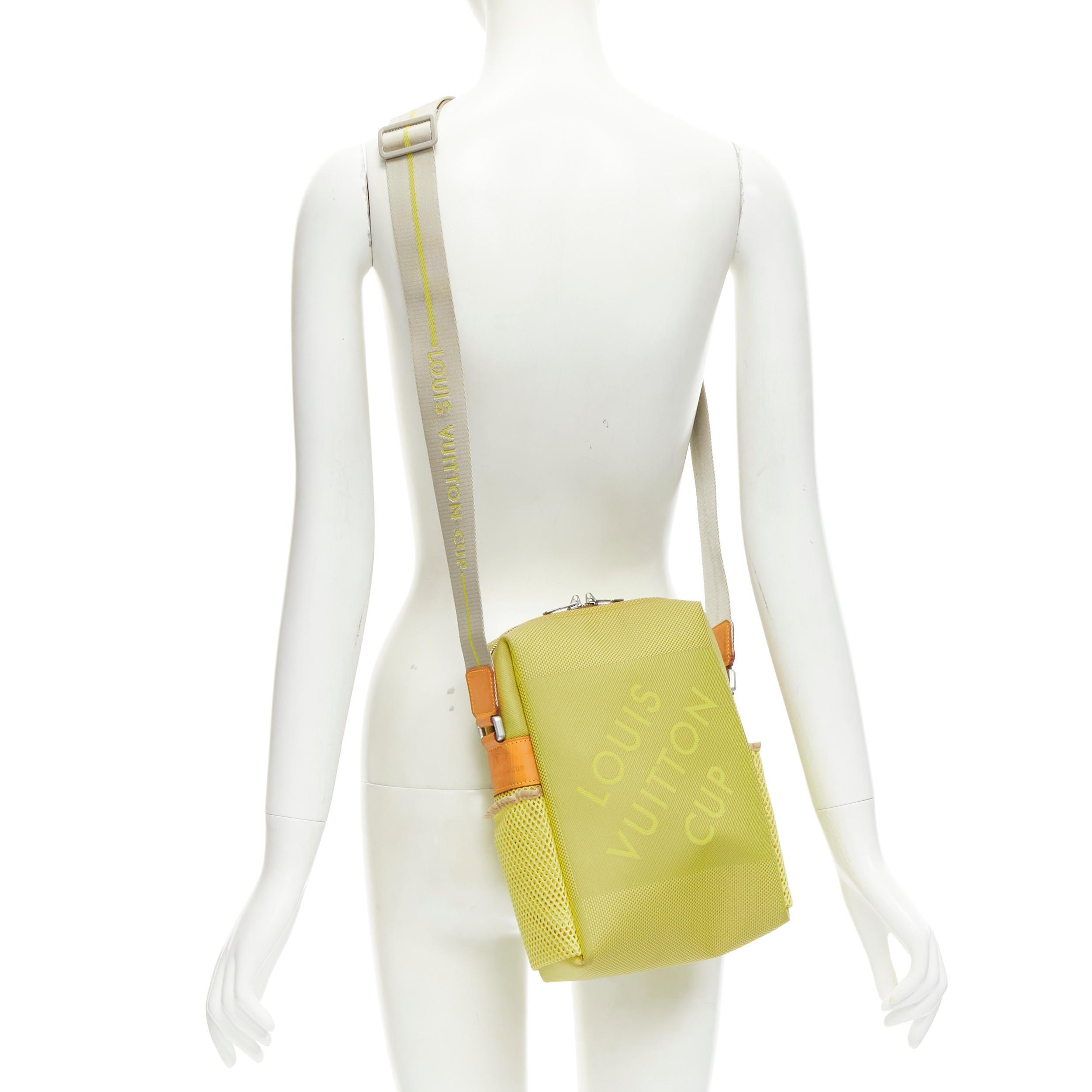 LOUIS VUITTON 2003 LV CUP Geant neon yellow damier canvas messenger crossbody bag
Reference: KELE/A00026
Brand: Louis Vuitton
Designer: Marc Jacobs
Model: Geant LV Cup
Collection: 2003
Material: Canvas, Mesh
Color: Neon Yellow, Brown
Pattern: