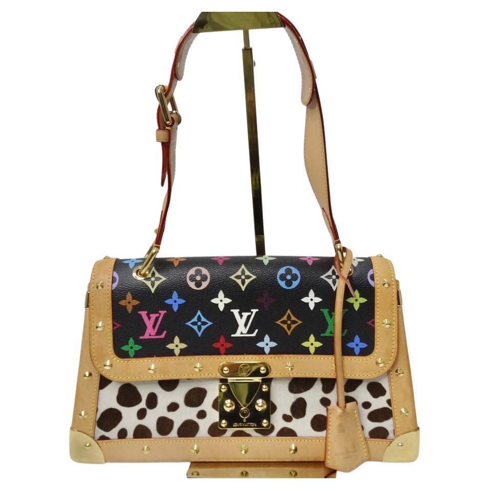 Wow! This vintage Louis Vuitton monogram Dalmatian shoulder bag is such a show stopper! Multicolor signature Louis Vuitton monogram comes together with camel leather and Dalmatian print calf hair to create what is possibly the most vibrant and