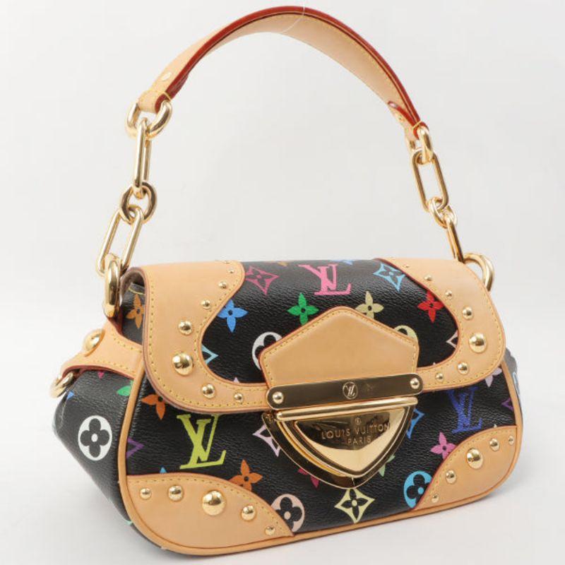 Louis Vuitton 2007 Made Monogram Marilyn Handbag Multi/Black

Additional information:
Interior pocket x1, 2007
Made in France
Measurements: 24 W x 11 D x 14 H cm
Shoulder drop: 43 cm
Condition: Good
Front: With slight darkening, stain and rubbing on