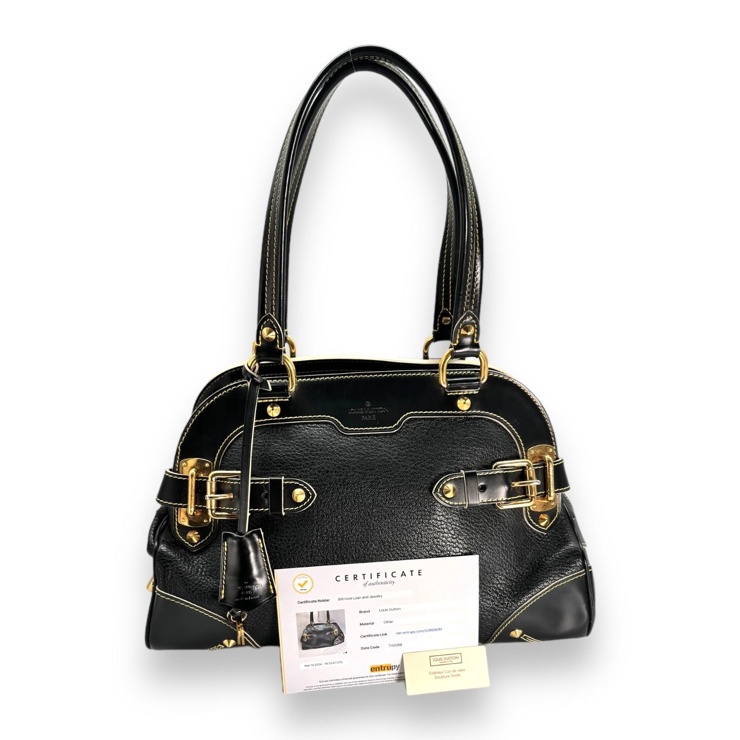 This Louis Vuitton Black Suhali Le Radieux Satchel is the ultimate statement piece for any fashion-forward individual. Made from luxurious black Suhali goatskin leather, it exudes elegance and sophistication. With three interior pockets and a zip
