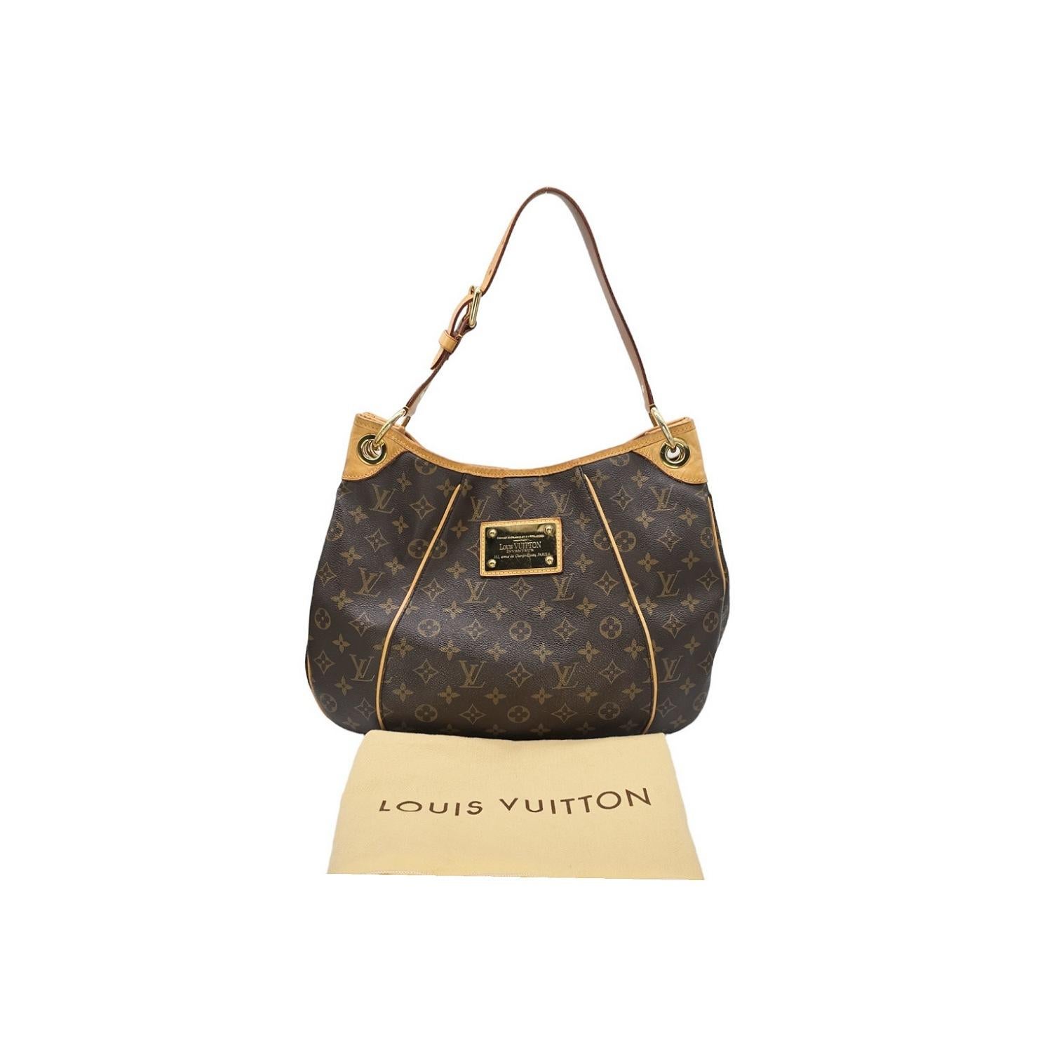 The Louis Vuitton Monogram Galleria PM is an expertly crafted handbag, made in the USA with high-quality canvas, leather, and gold-tone hardware. Its magnetic snap closure opens to a luxurious Alcantara interior with ample space and pockets, while