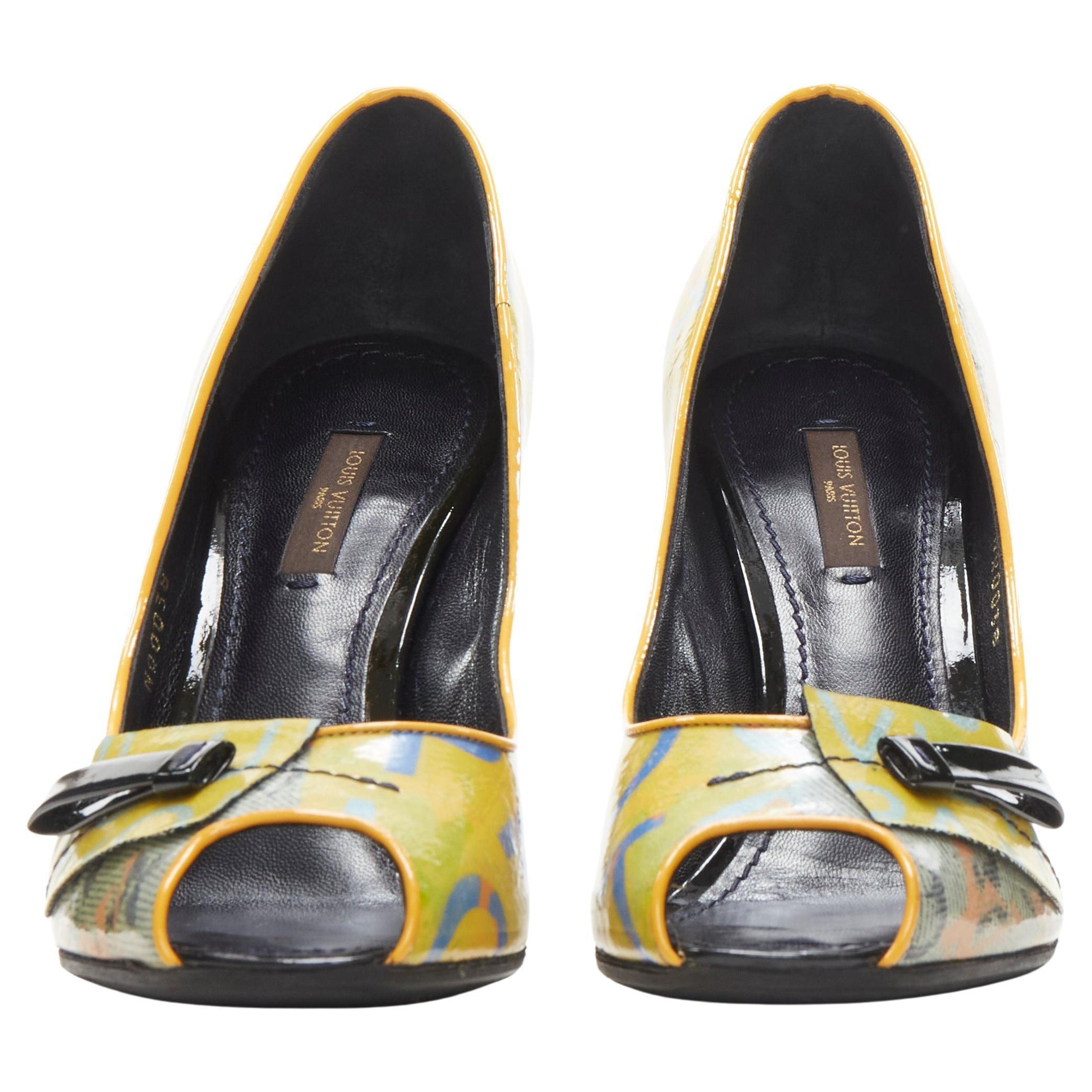 LOUIS VUITTON 2008 Richard Prince denim yellow monogram peep toe heel EU37
Brand: Louis Vuitton
Model: Richard Prince NQ0038
Collection: 2008 
Material: Patent Leather
Color: Yellow
Pattern: Abstract
Extra Detail: Patch applique at toe. Peep