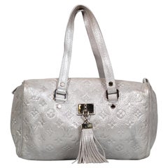 Louis Vuitton 2008 Silver Leather Comète Bag
