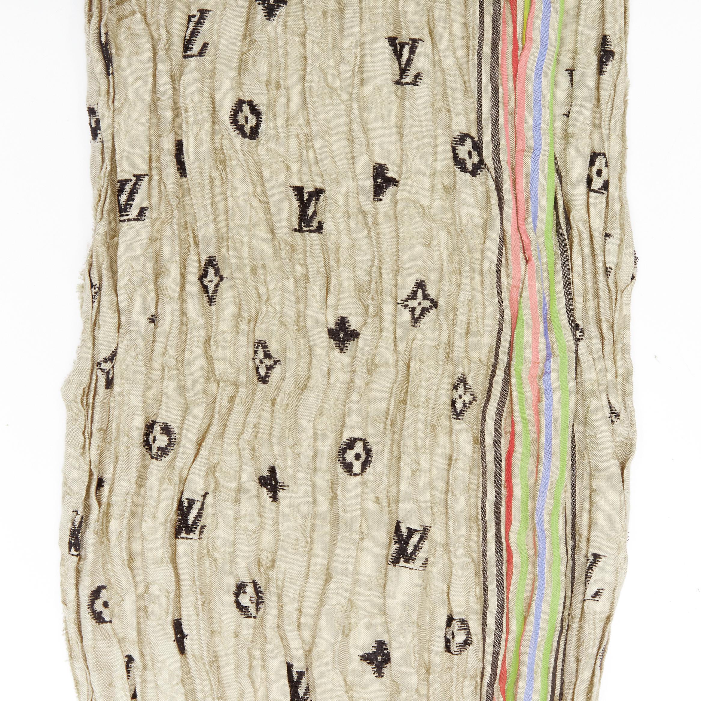 LOUIS VUITTON 2009 Cheche Bohemian silk linen rainbow striped monogram scarf 
Reference: ANWU/A00585 
Brand: Louis Vuitton 
Collection: Cheche Bohemian 
Material: Silk 
Color: Brown 
Pattern: Checked 
Extra Detail: LV monogram jacquard. Rainbow