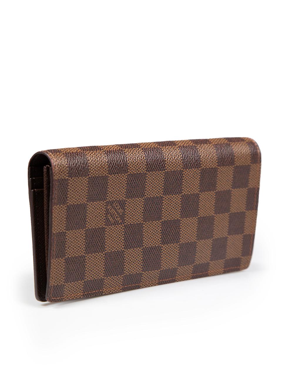 CONDITION is Very good. Minimal wear to wallet is evident. Minimal abrasion to the lowest cardholder pocket on the internal left side and near the logo on the internal right side of this used Louis Vuitton designer resale item.
 
 
 
 Details
 
 
