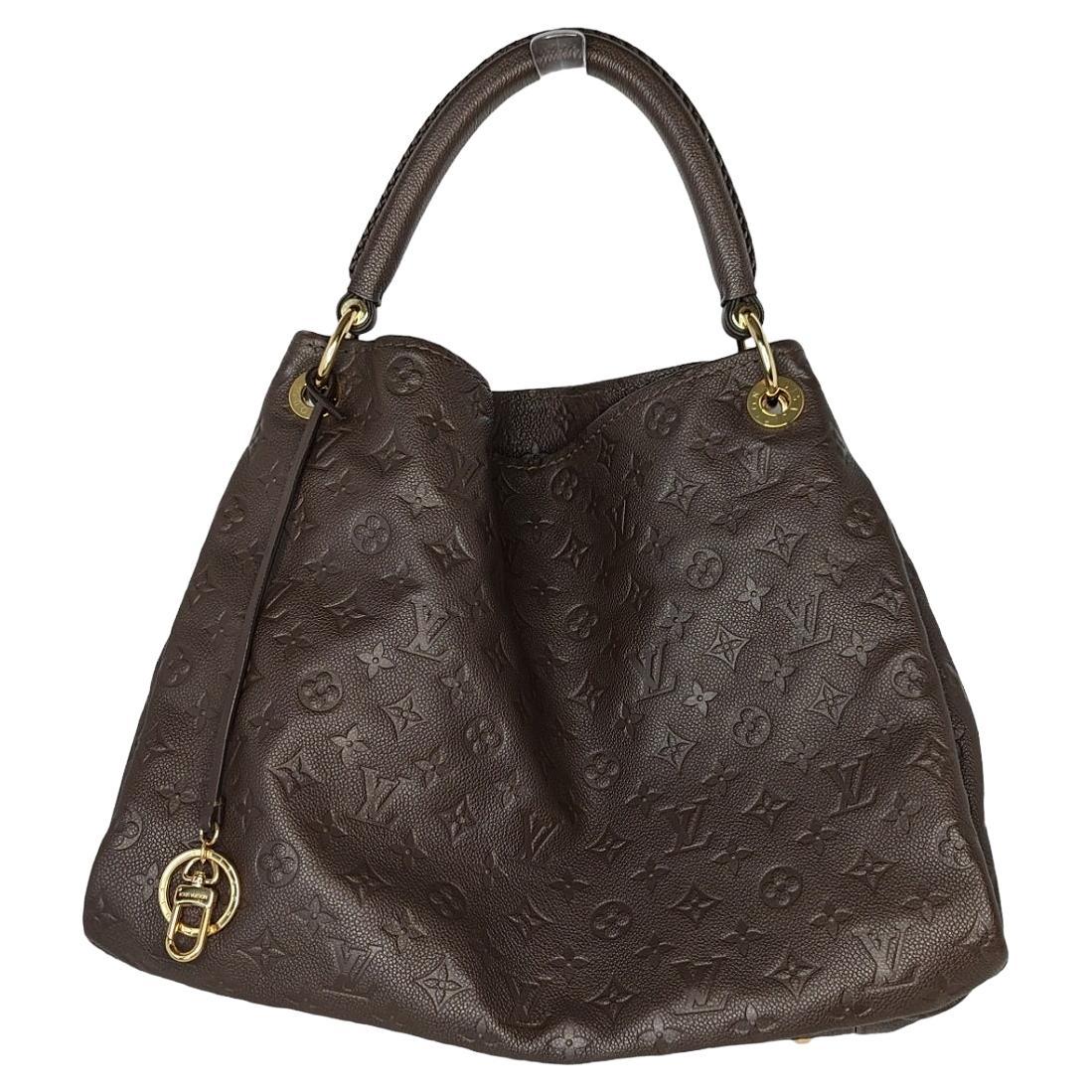 Louis Vuitton 2012 Monogram Empreinte Leather Artsy Hobo