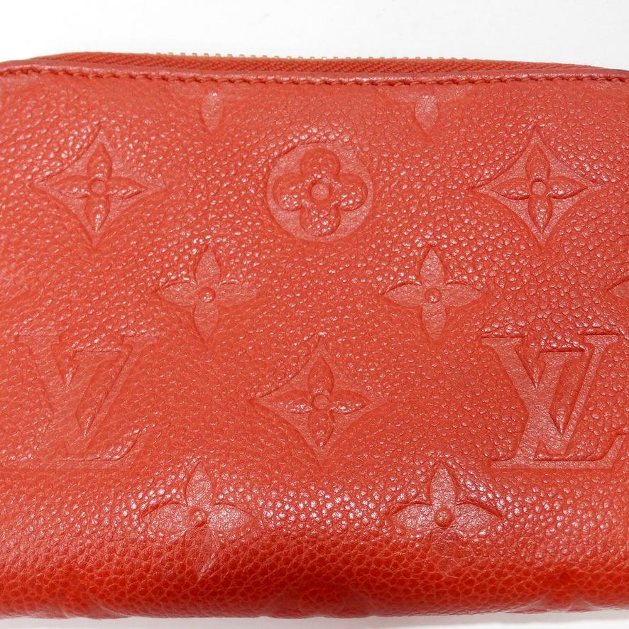 Rouge Louis Vuitton 2012 Portefeuille Monogram Secrète en vente